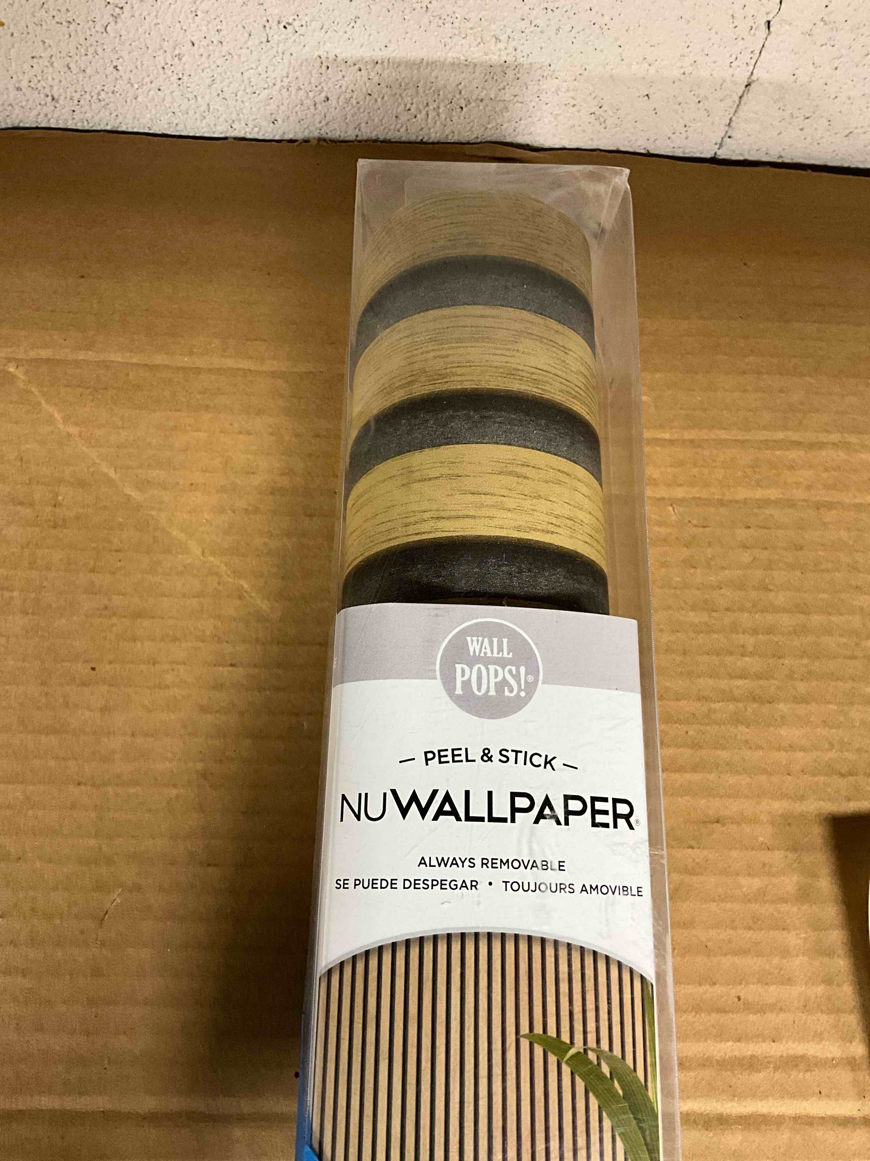 Condition photo showing New/Like New for faux wood slat natural peel and stick wallpaper