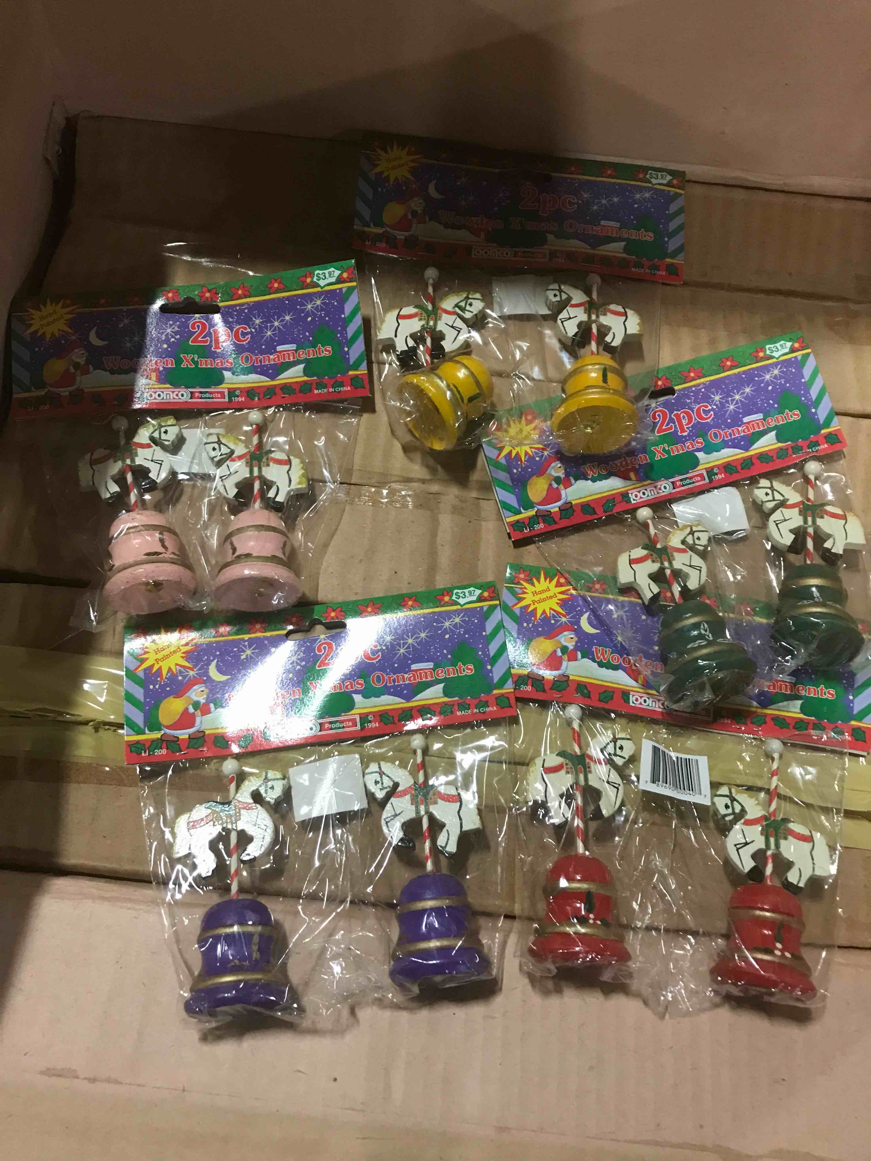 ASSORTED COLOR SETS OF WOODEN HORSES ON BELLS