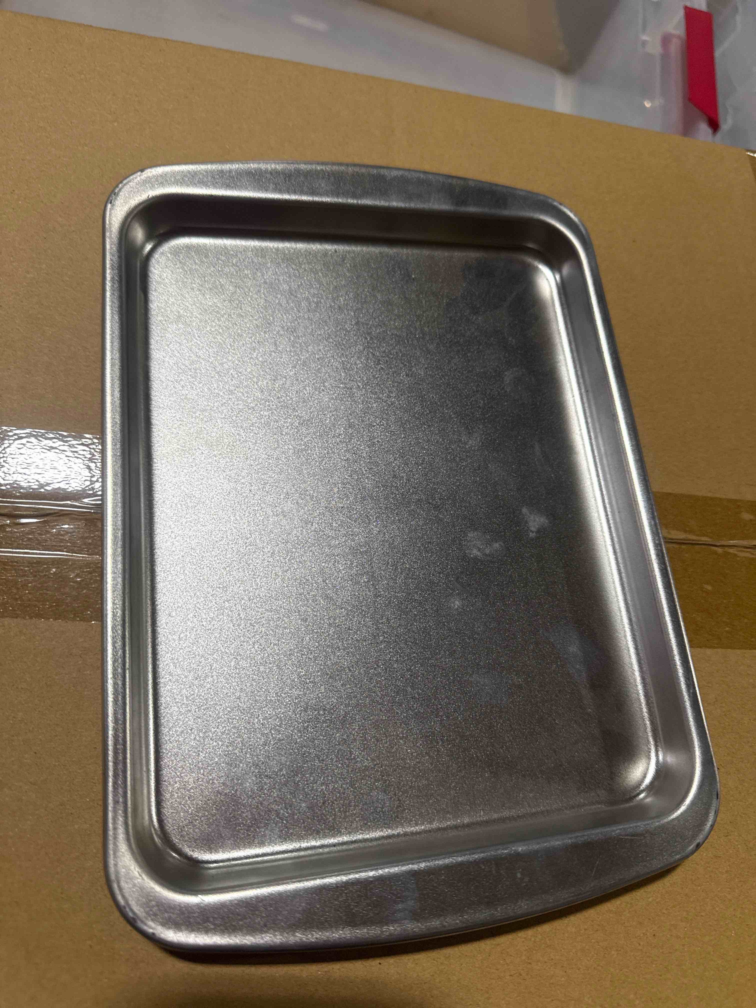Condition photo showing New/Like New for set of 4 mini baking pans 6.5” x 8” nonstick metal baking trays for baking, roasting & meal prep