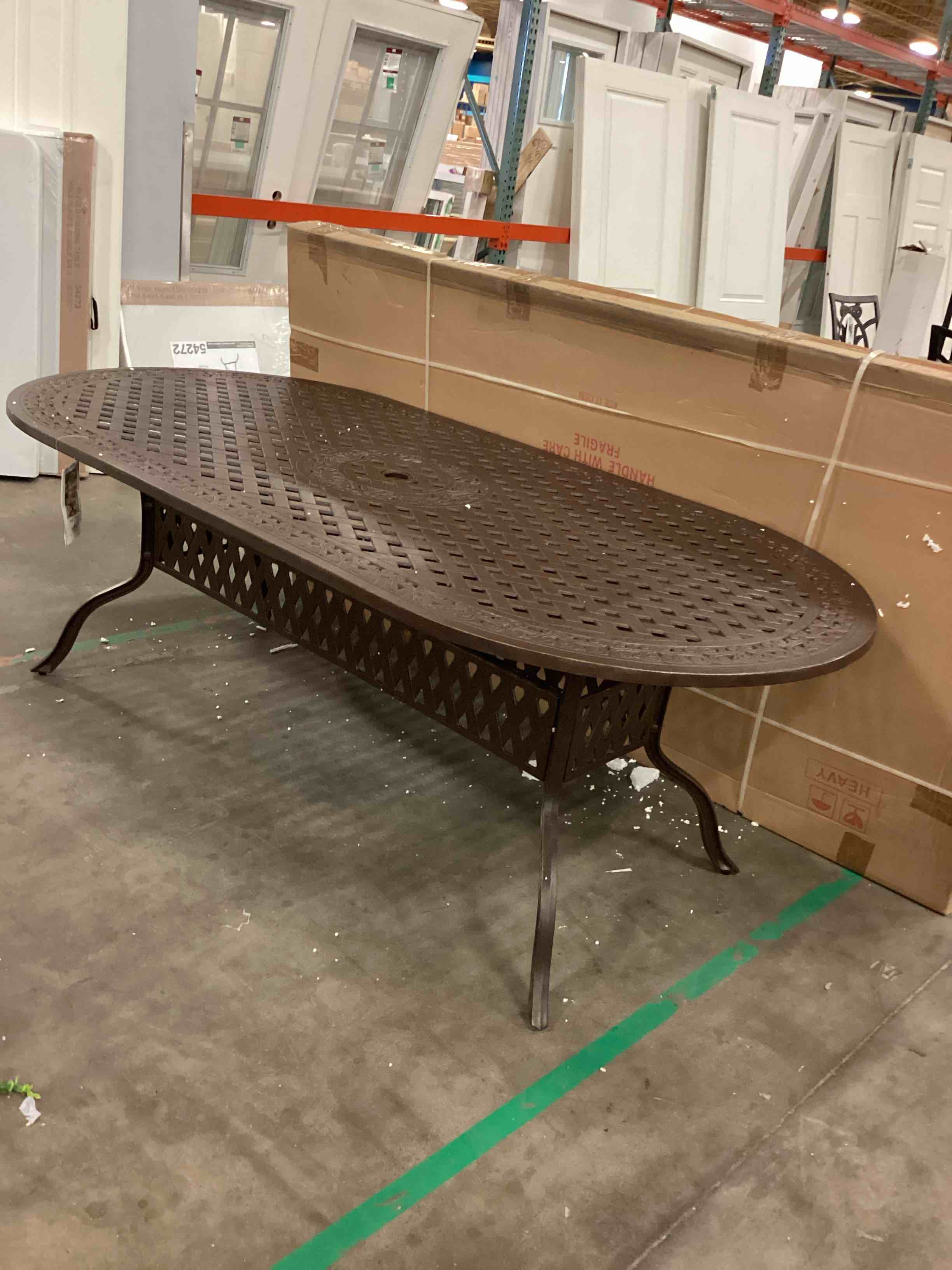 https://s3.amazonaws.com/lotting-images-prod/ovaltablebronze_1752259607187.jpeg