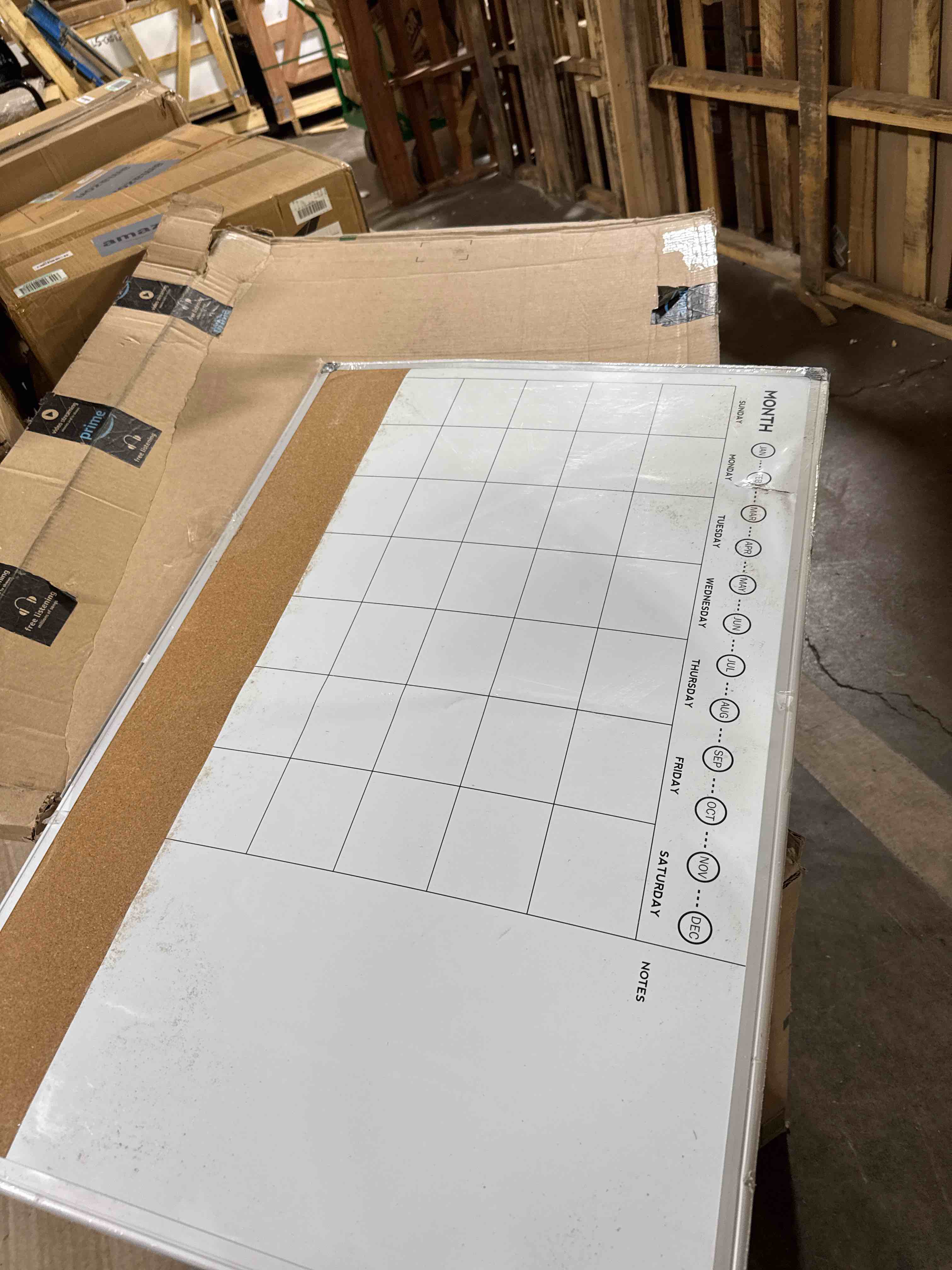 Condition photo showing As Is for Amazon Basics 24" x 36" Monthly Whiteboard Calendar with Cork Board, Wall Mounted, Easy to Install, Silver Aluminum Frame