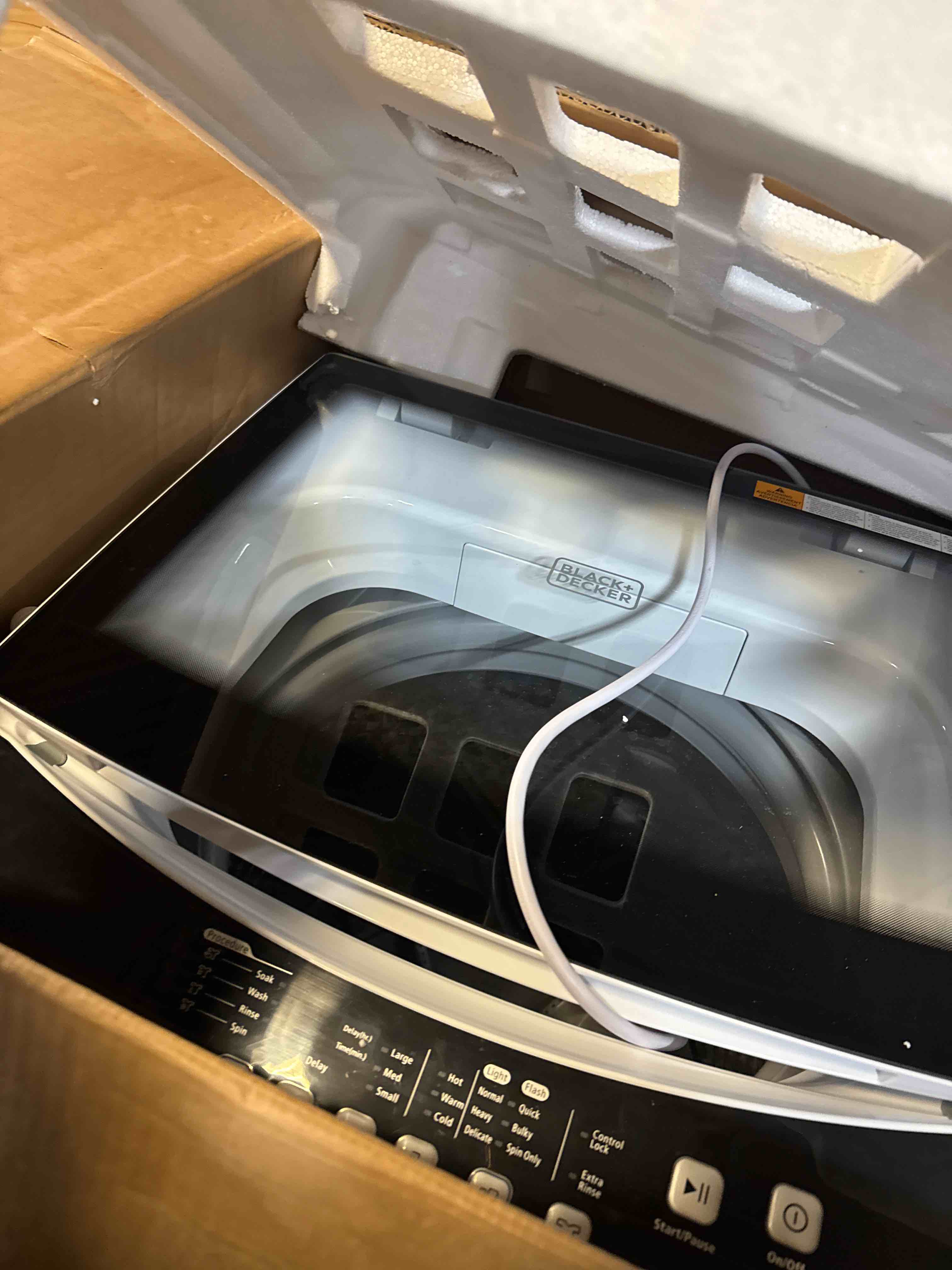 Condition photo showing New/Like New for Black & Decker 3.0' Cubic Portable Washer