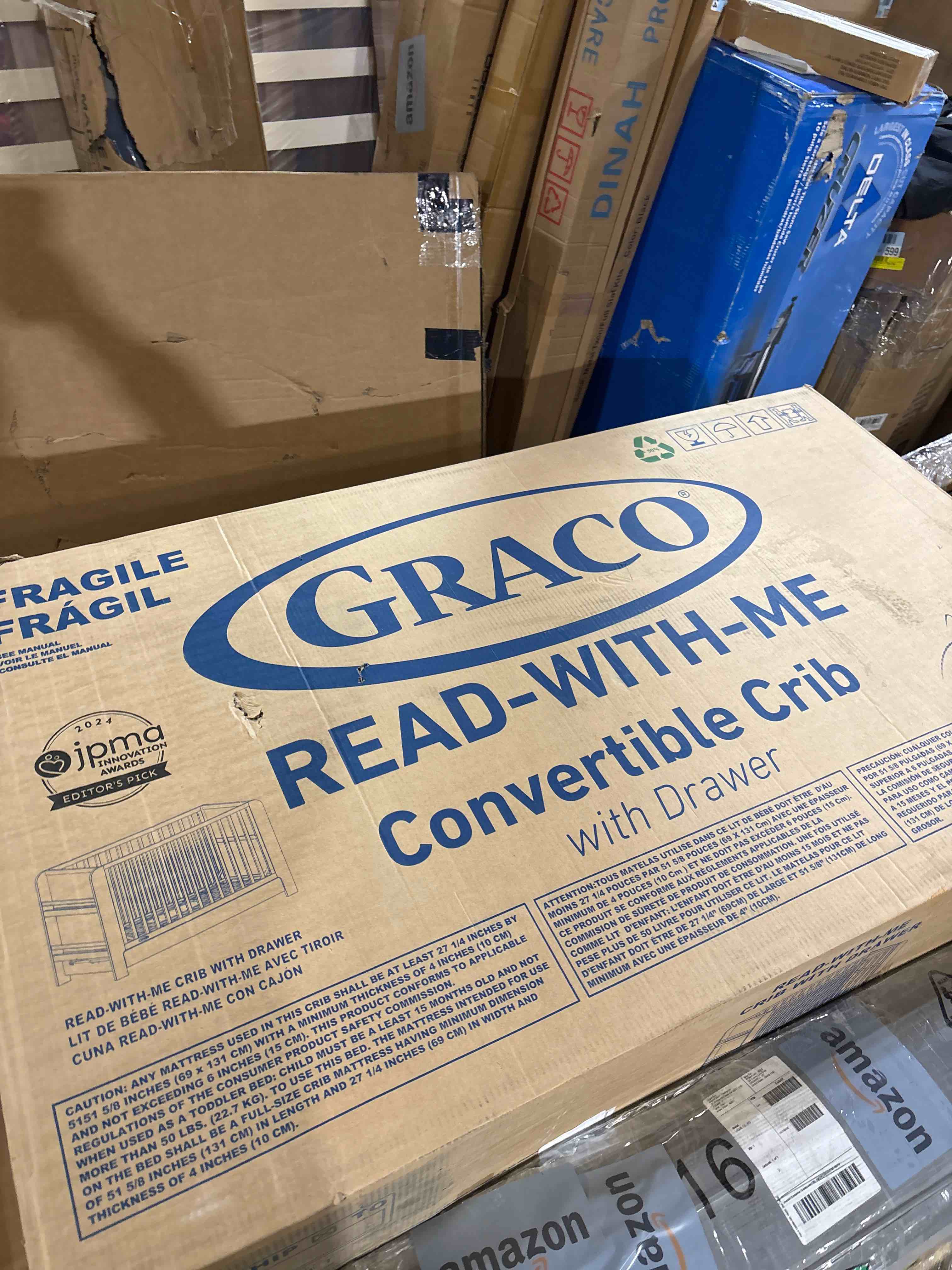 Condition photo showing New/Like New for Graco Read-with-Me 4-in-1 Convertible Crib with Drawer (Blush with Driftwood) - GREENGUARD Gold Certified Converts to Toddler Bed, Daybed, and Functional Bookshelves