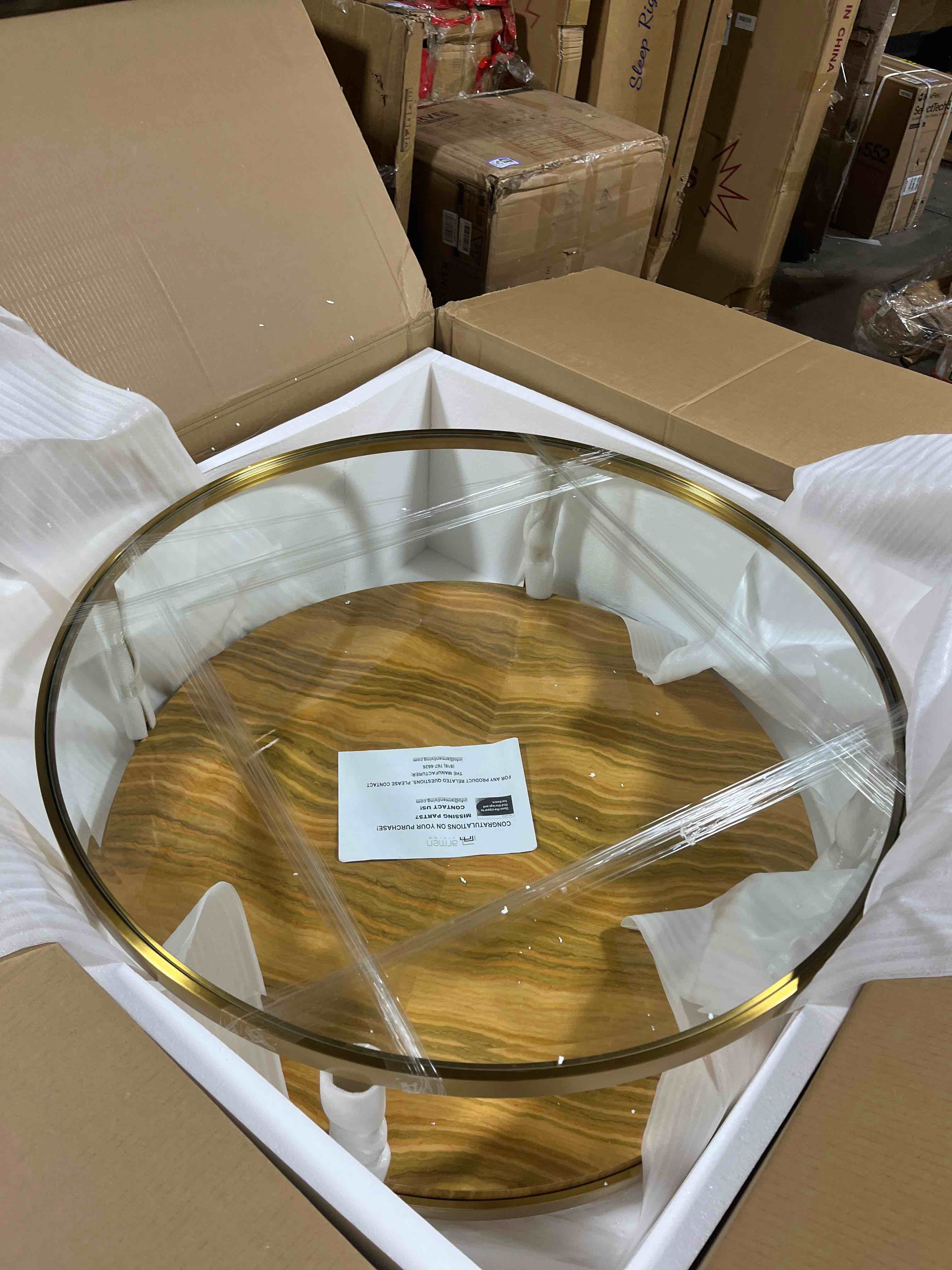 Condition photo showing New/Like New for Armen Living Hattie Modern Glass Top Coffee Table with Brushed Gold Legs, Yellow