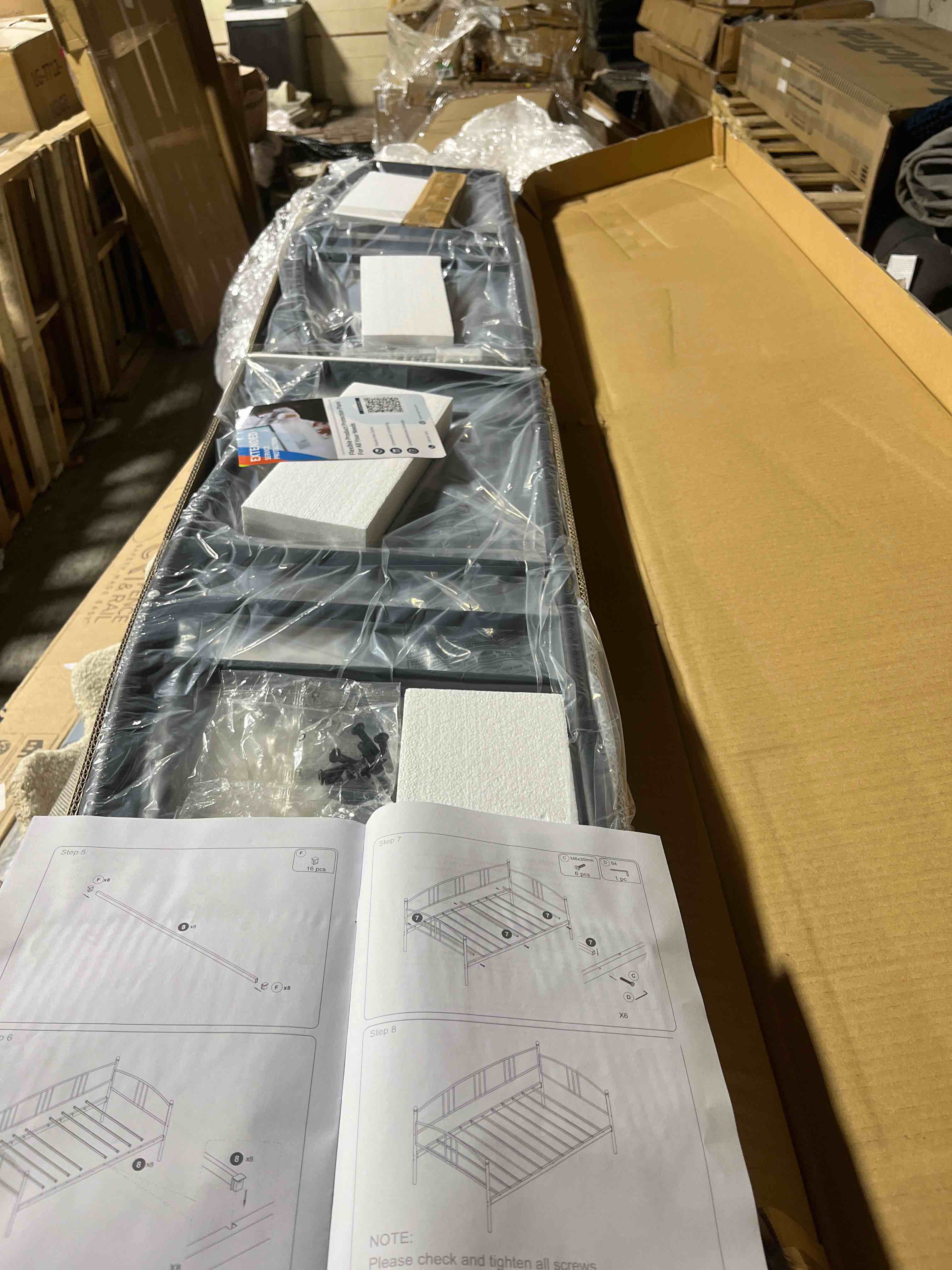 Condition photo showing New/Like New for Garvee Twin Metal Daybed with Trundle, with Arched Headboard, Guest Sofa Bed with Steel Slat Support, No Box Spring Required, Easy Assembly, Black