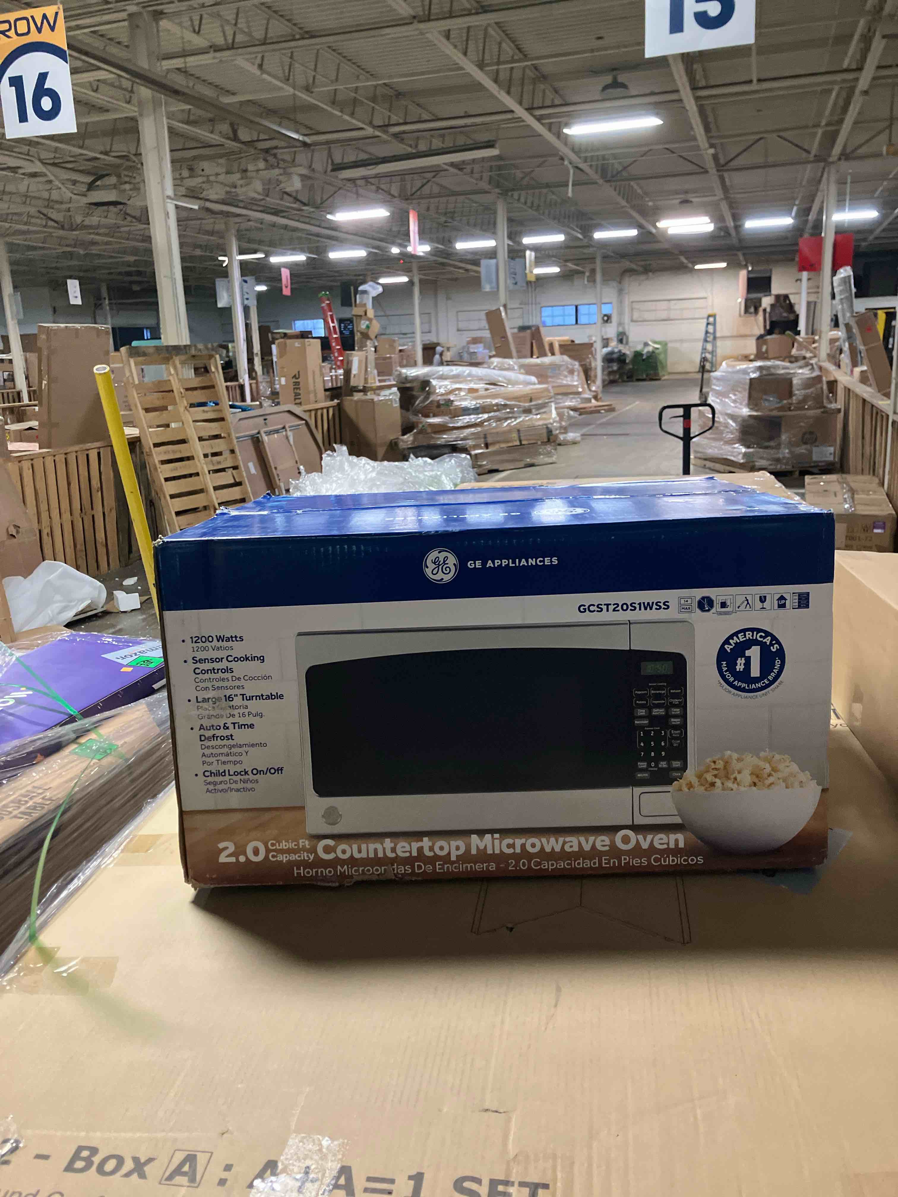 Condition photo showing New/Like New for GE Countertop Microwave Oven,1, 200-watt Capacity, 2.0 Cubic Ft., 8 Auto Setting Cooking Settings, Child-Lock Technology, Kitchen Essentials for the Countertop, Dorm Room or Apartment, Stainless Steel 2.0 Cu.Ft. Stainless Steel