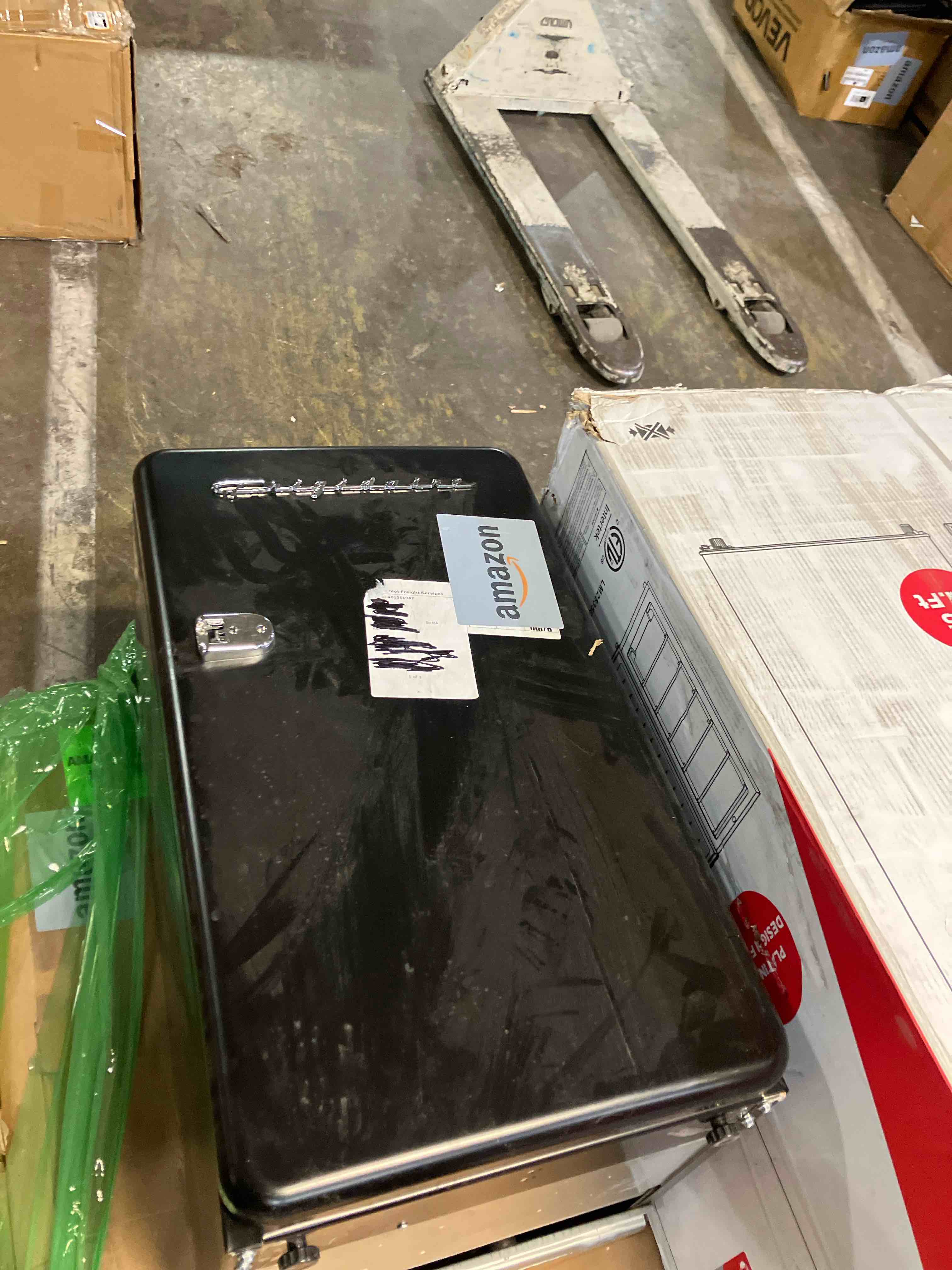 Condition photo showing New/Like New for Frigidaire Retro Compact Refrigerator with Chiller, 3.2 cu ft Countertop Fridge, Built-In Bottle Opener, Rounded Corners, Premium, for Office, Bedroom, Dorm Room, Cabin, 18.5D x 20W x 31.5H (Black) Black Solid