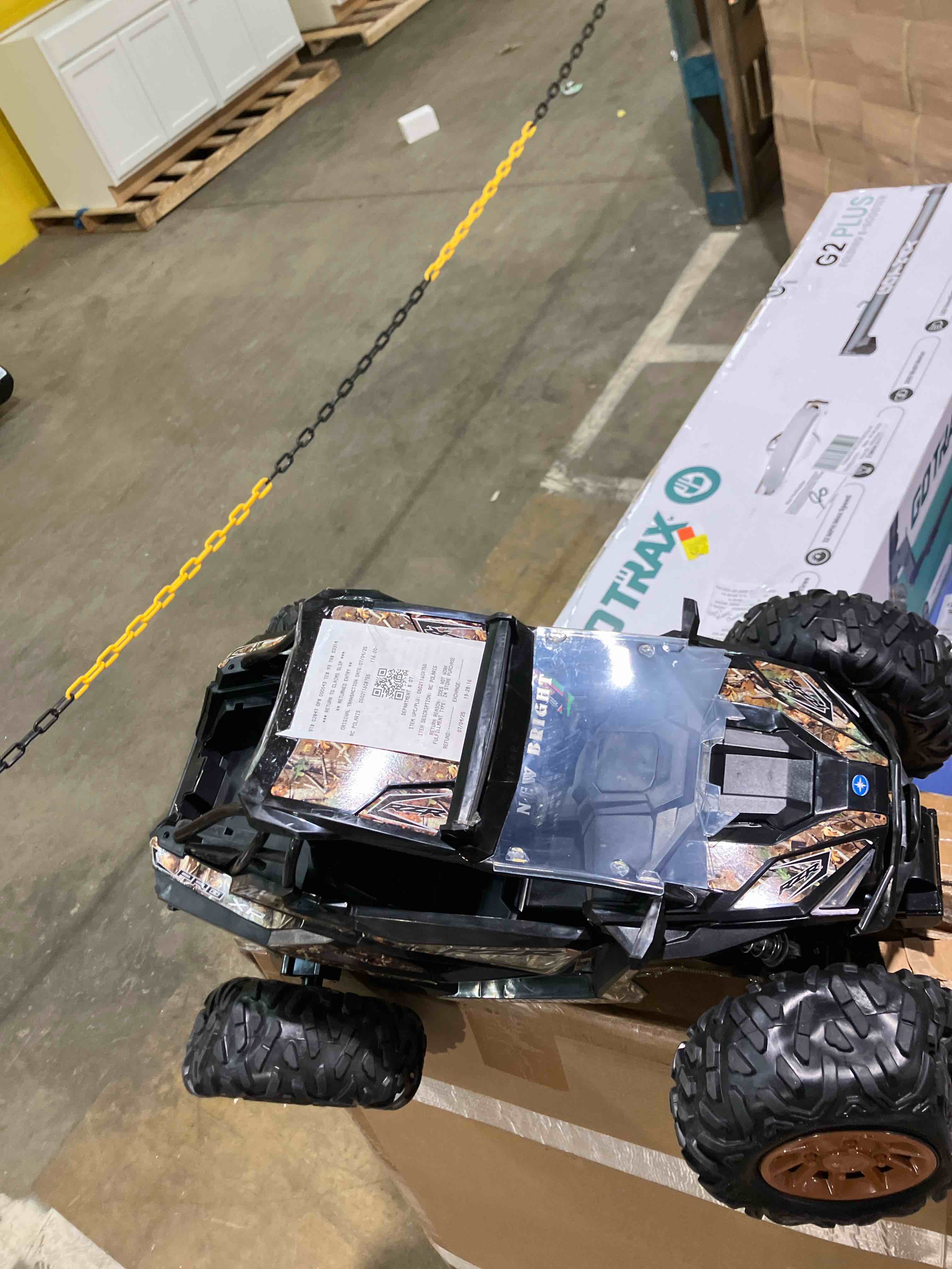 Condition photo showing As Is for New Bright (1:5) Polaris RZR XP Pro 12.8V Battery Remote Control Camo ATV 2.4GHz, 60875U Child (Missing remote, and car has some damage)