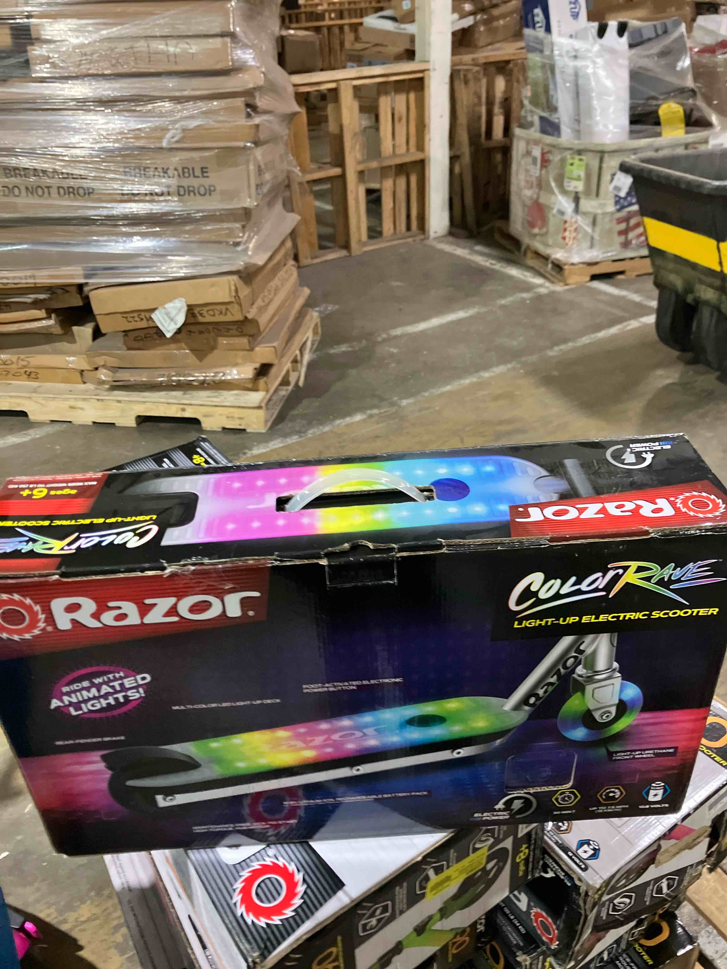 Condition photo showing Good Condition for Razor Color Rave Electric Scooter - Colorful Light-Up Deck, up to 7.5 mph, for Child Ages 6+ (Used)