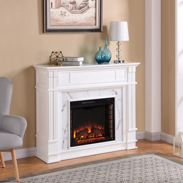 SEI Furniture Occom Electric Fireplace with Faux Marble Mantel with Media Storage - Brick Accent Firebox