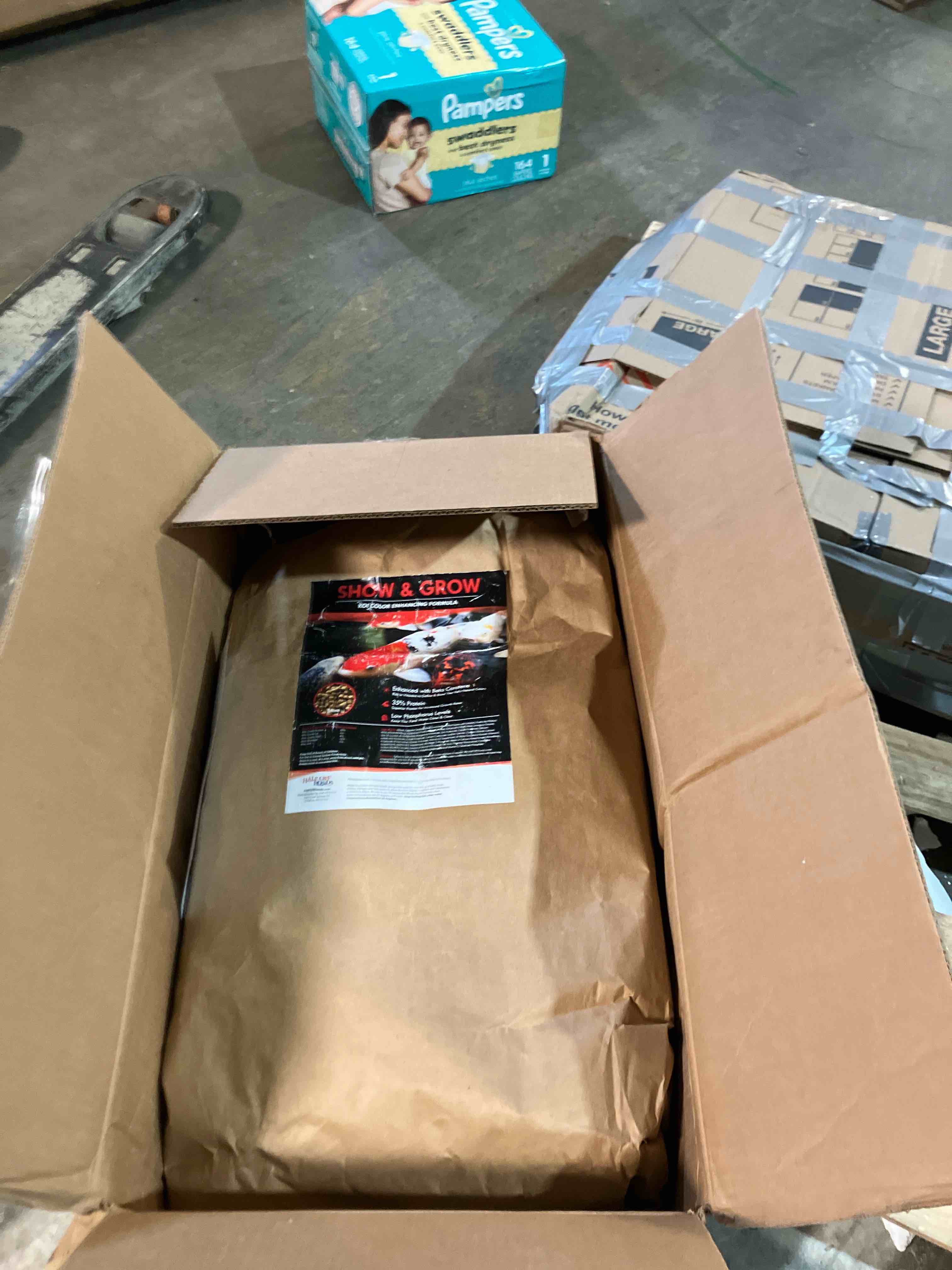 Condition photo showing New/Like New for HALF OFF PONDS Show and Grow Koi and Goldfish Color Enhancing and Protein Food 50 lb Bag - KOISG-050 Show and Grow Formula 50 Pound (Pack of 1)