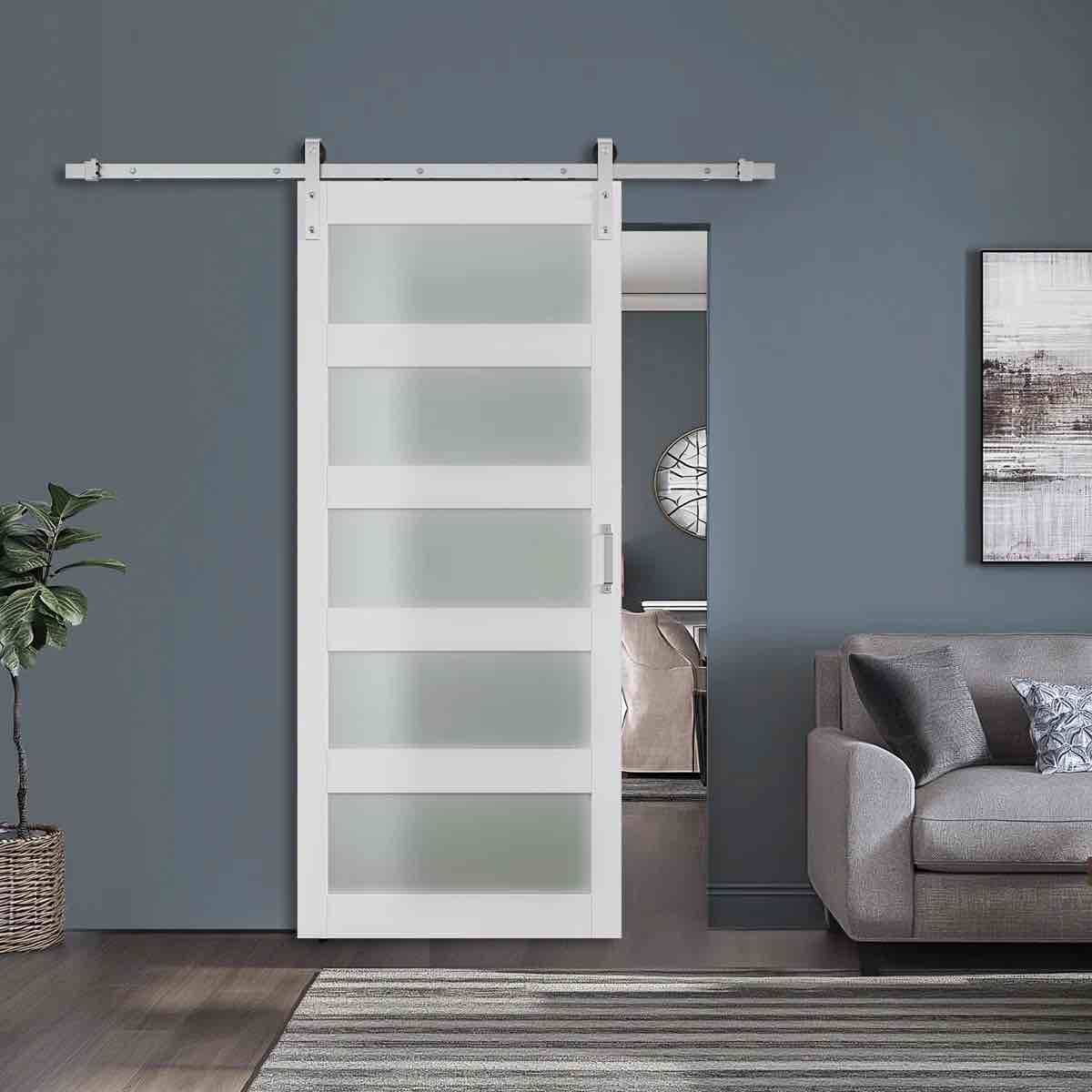 glass and manufactured solid wood paneled barn door with brushed nickel hardware kit