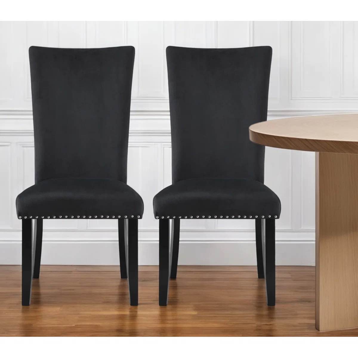 Condition photo showing New/Like New for set of two black upholstered velvet dining side chairs