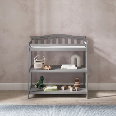 Condition photo showing New/Like New for camden child craft arch top changing table with pad