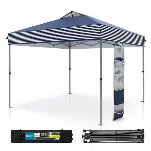 Condition photo showing New/Like New for 10 ft. x 10 ft. pop up canopy tent with carry bag sandbags vented top in navy stripes