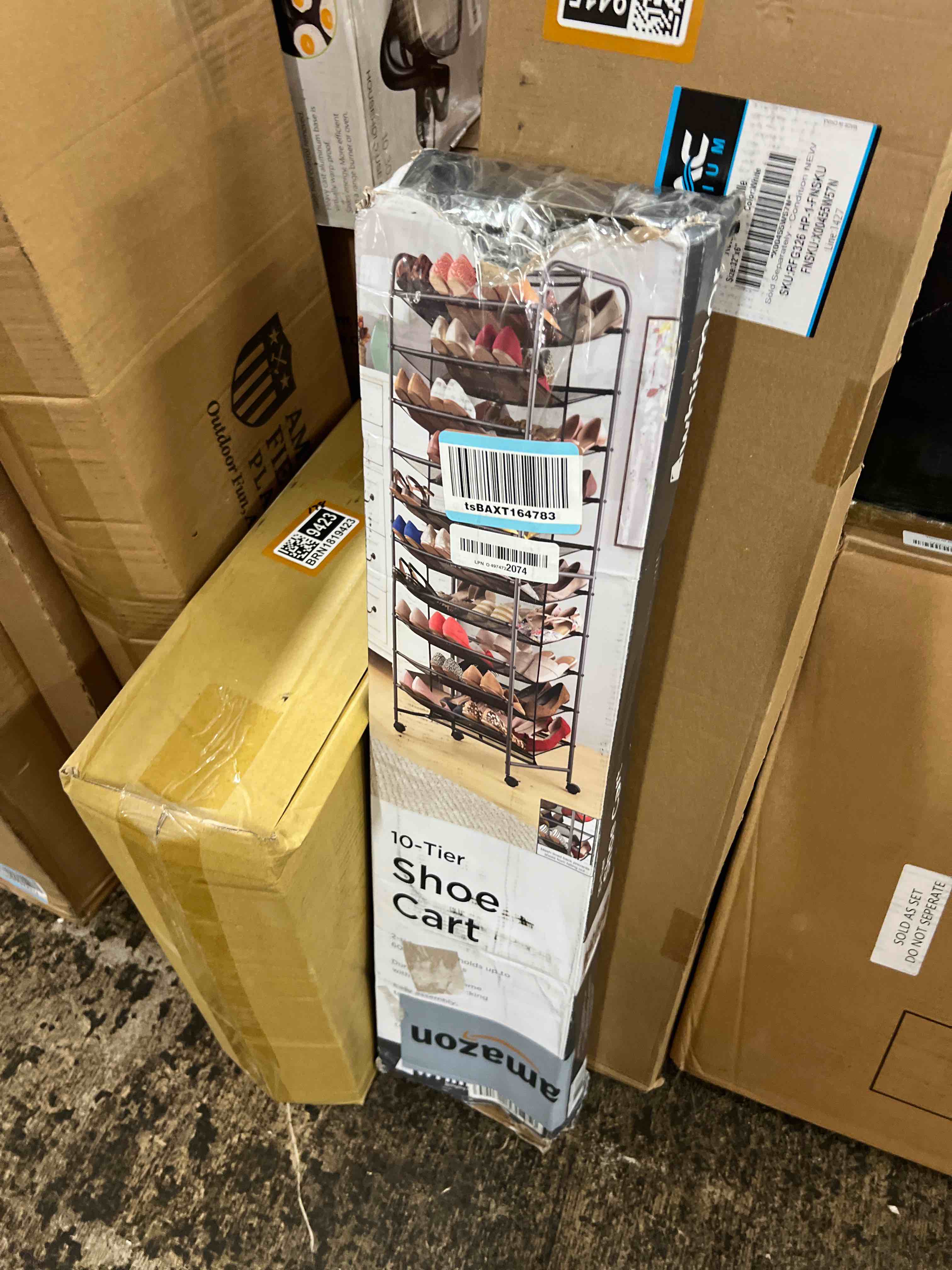 Condition photo showing New/Like New for whitmor 10 tier double-sided shoe cart with lockable wheels, gunmetal rolling shoe organizer with patented mesh back, freestanding storage for garage, bedroom, or closet, 17" w×24.6" l×63.78" h