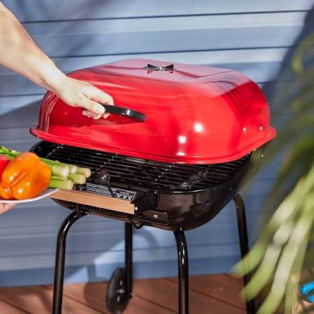 Americana Swinger Charcoal Grill in Red