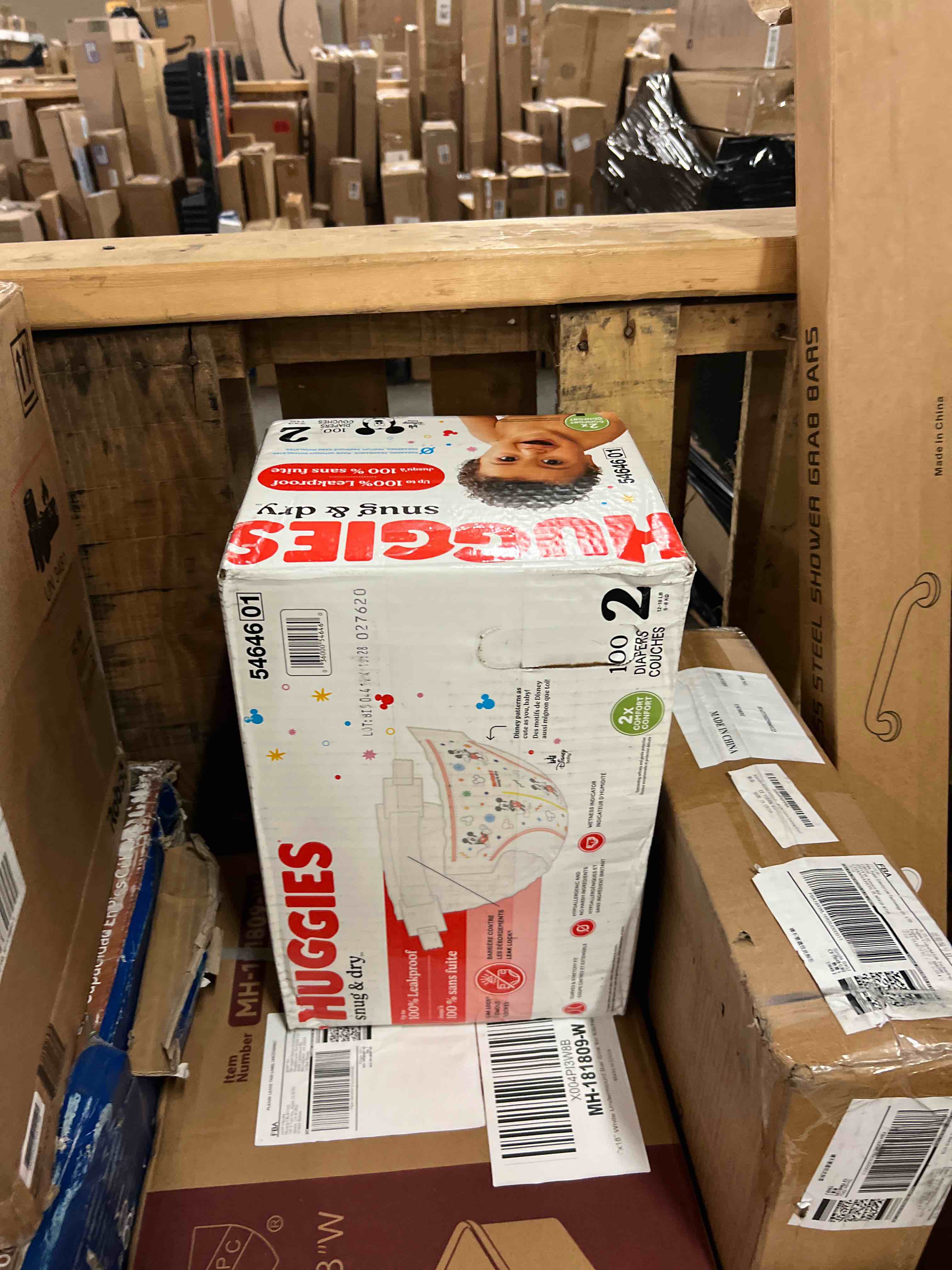 Condition photo showing New/Like New for Huggies Size 2 Diapers, Snug & Dry Baby Diapers, Size 2 (12-18 lbs), 100 Count, Packaging May Vary Size 2 100