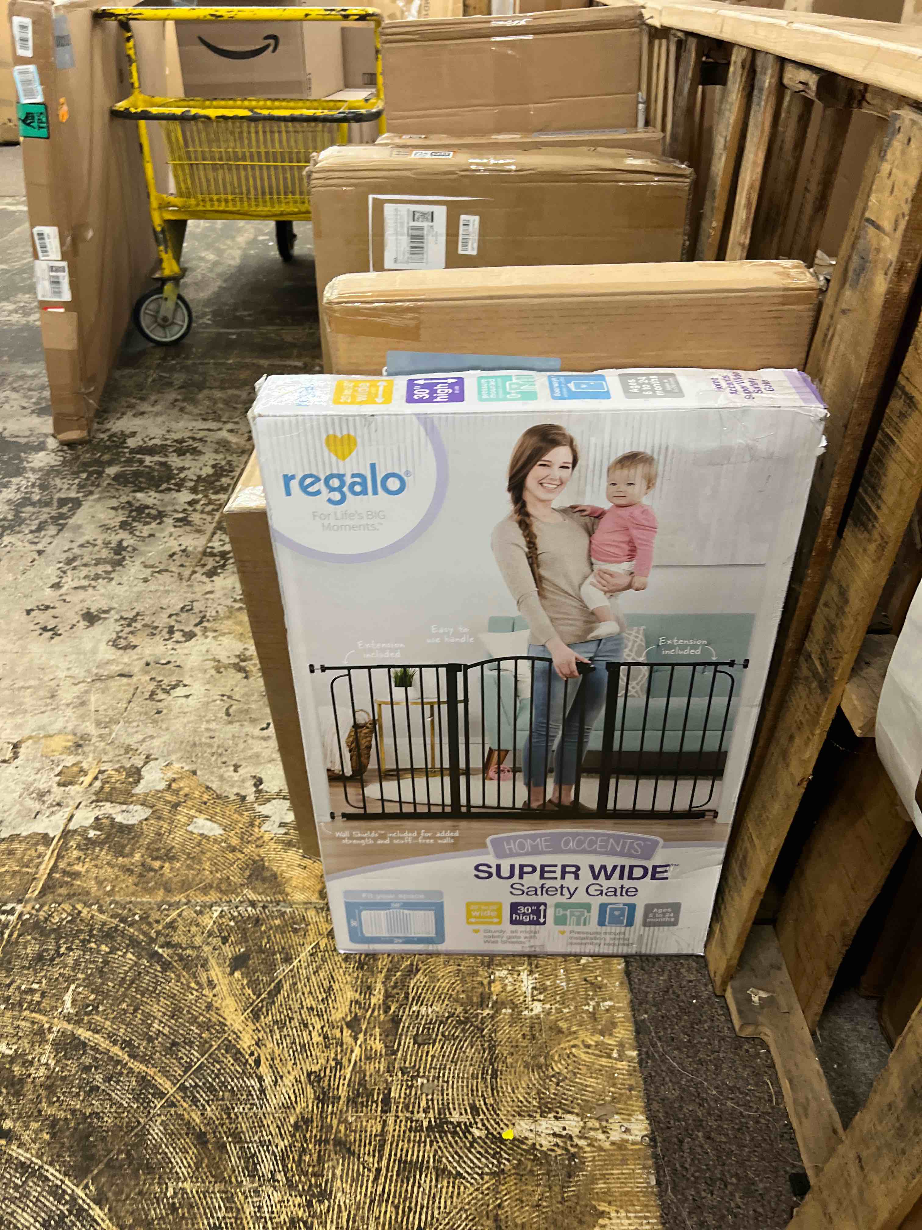 Condition photo showing New/Like New for Regalo 58-Inch Easy Step Extra Tall Arched Décor Walk Thru Baby Gate, Award Winning Brand, Includes 4-Inch Extension Kit, 4 Pack Pressure Mount Kit and 4 Pack Wall Mount Kit, Bronze Black - 29-58"w X 30"h