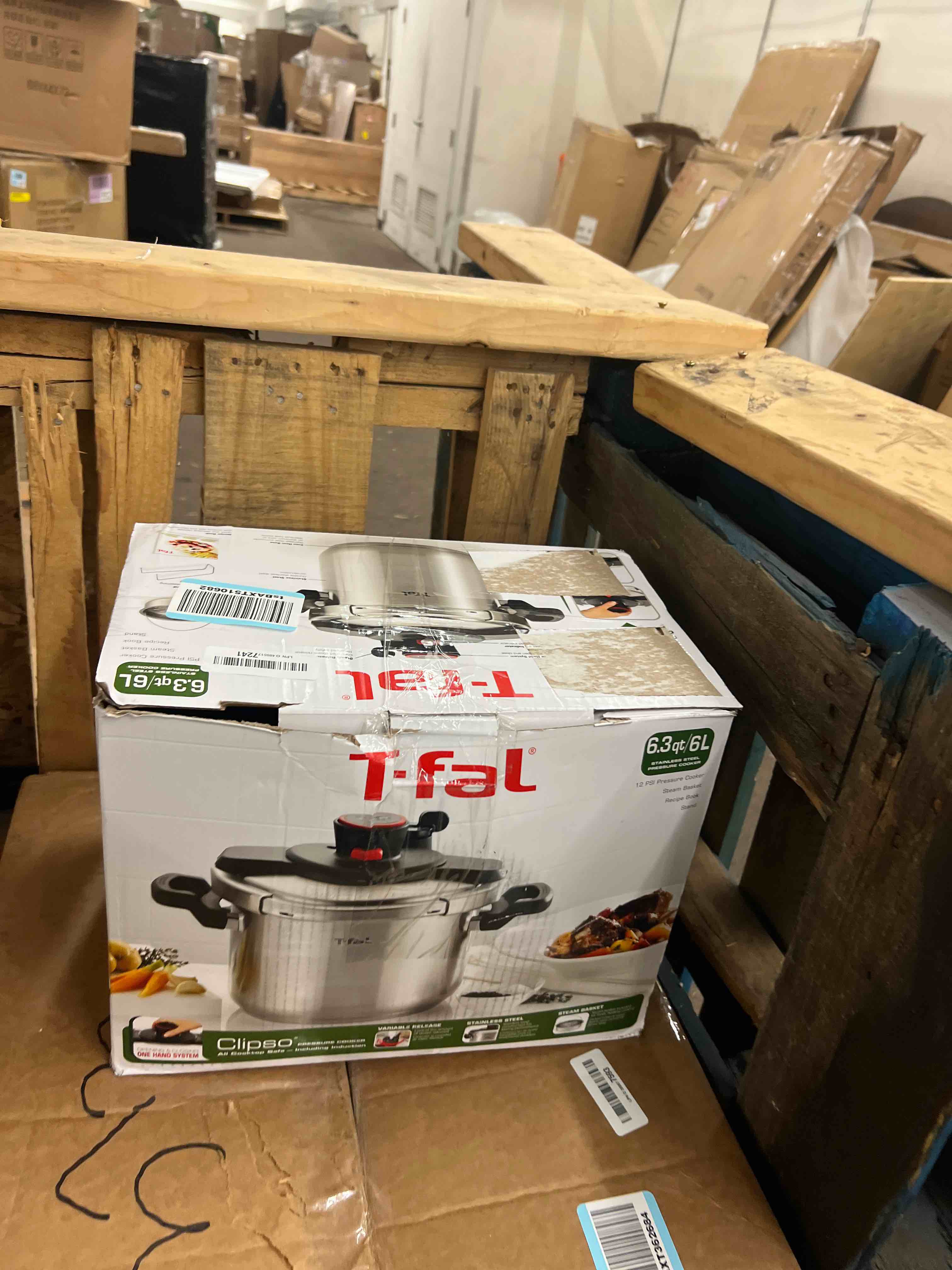 Condition photo showing New/Like New for t-fal clipso stainless steel pressure cooker, 6.3 quart, recipe book, steam basket, easy-open lid, secure locking system, adjustable pressure valve, induction cookware, pots and pans, kitchen, silver