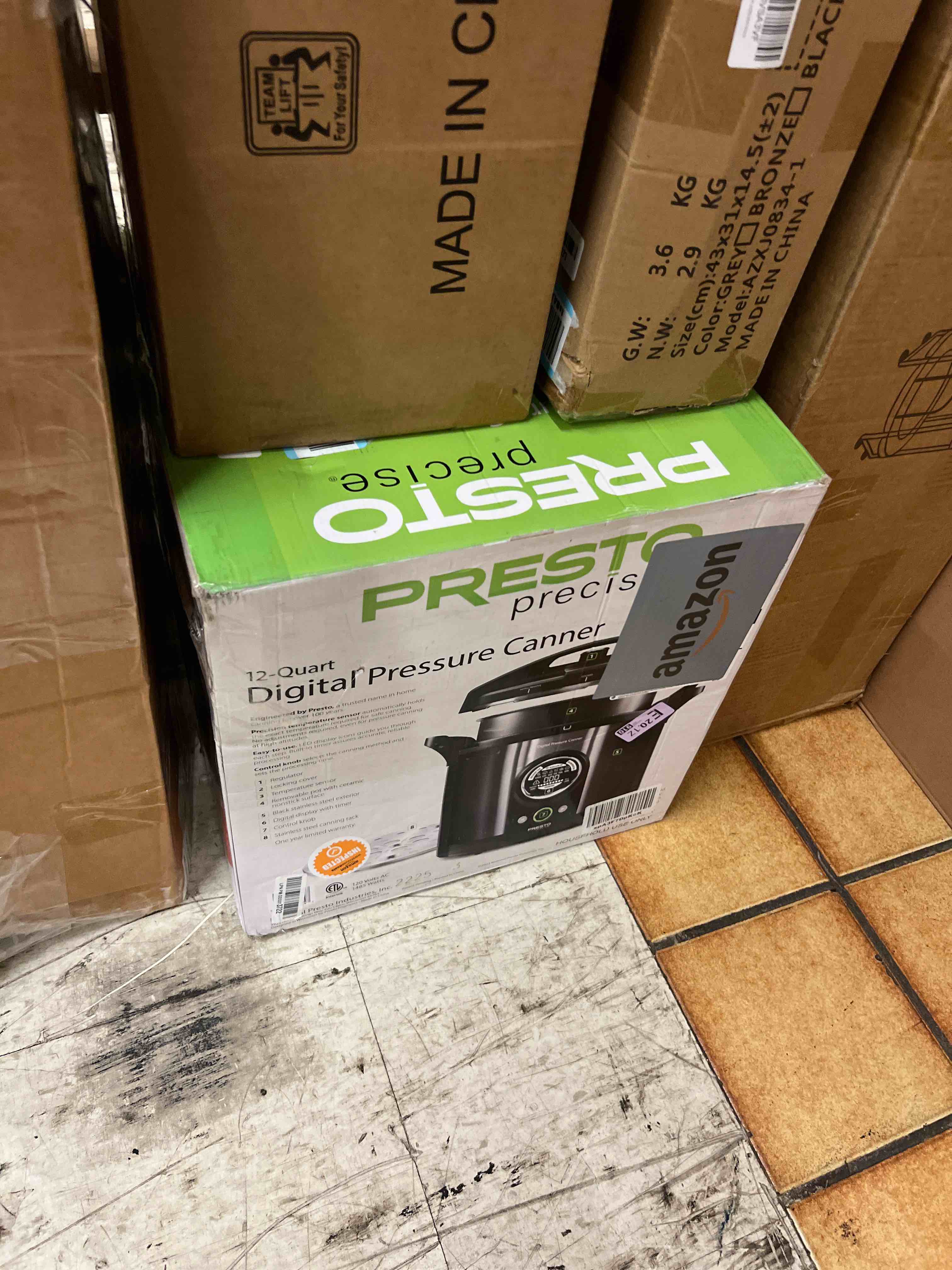 Condition photo showing New/Like New for presto 02144 12-quart digital pressure canner - digital display, waterbath capable, 10-built-in safety features, recipe book, black stainless steel 12 quarts