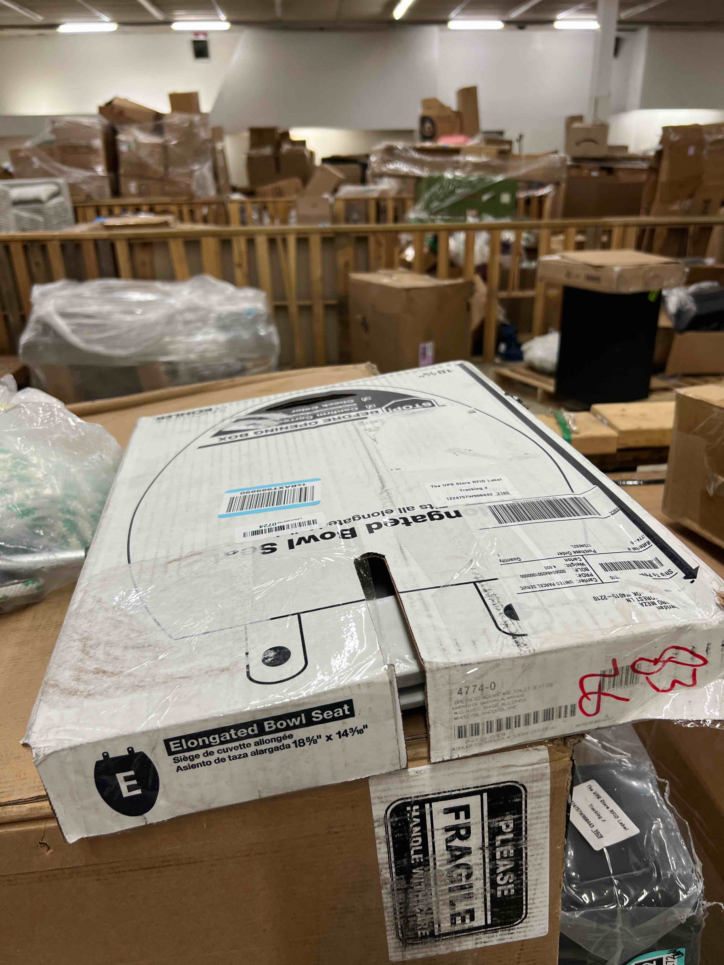 Condition photo showing New/Like New for kohler k-4774-0 brevia elongated white toilet seat with quick-release hinges and quick-attach hardware for easy clean, white