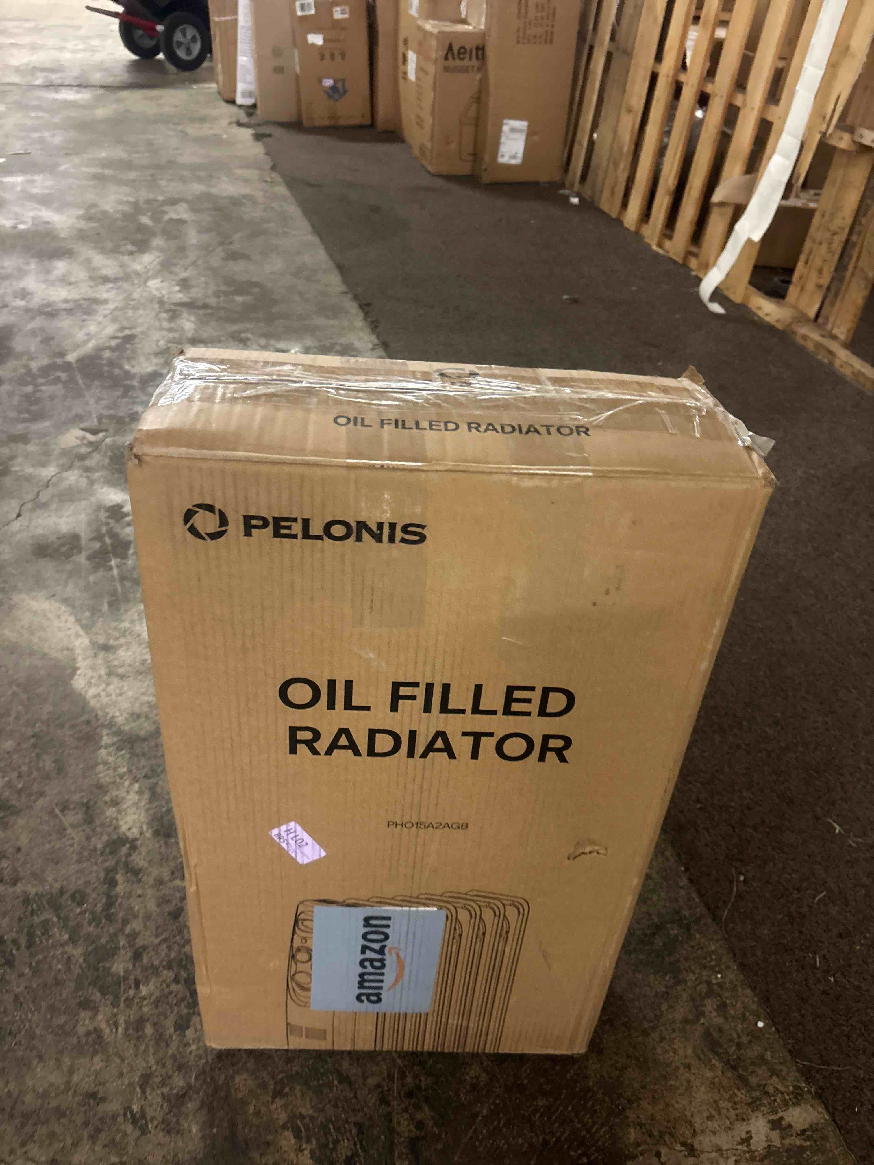 Condition photo showing New/Like New for PELONIS PHO15A2AGB, Basic Electric Oil Filled Radiator,black space heater, 26.10 x 14.20 x 11.00 Black 2024 Basic