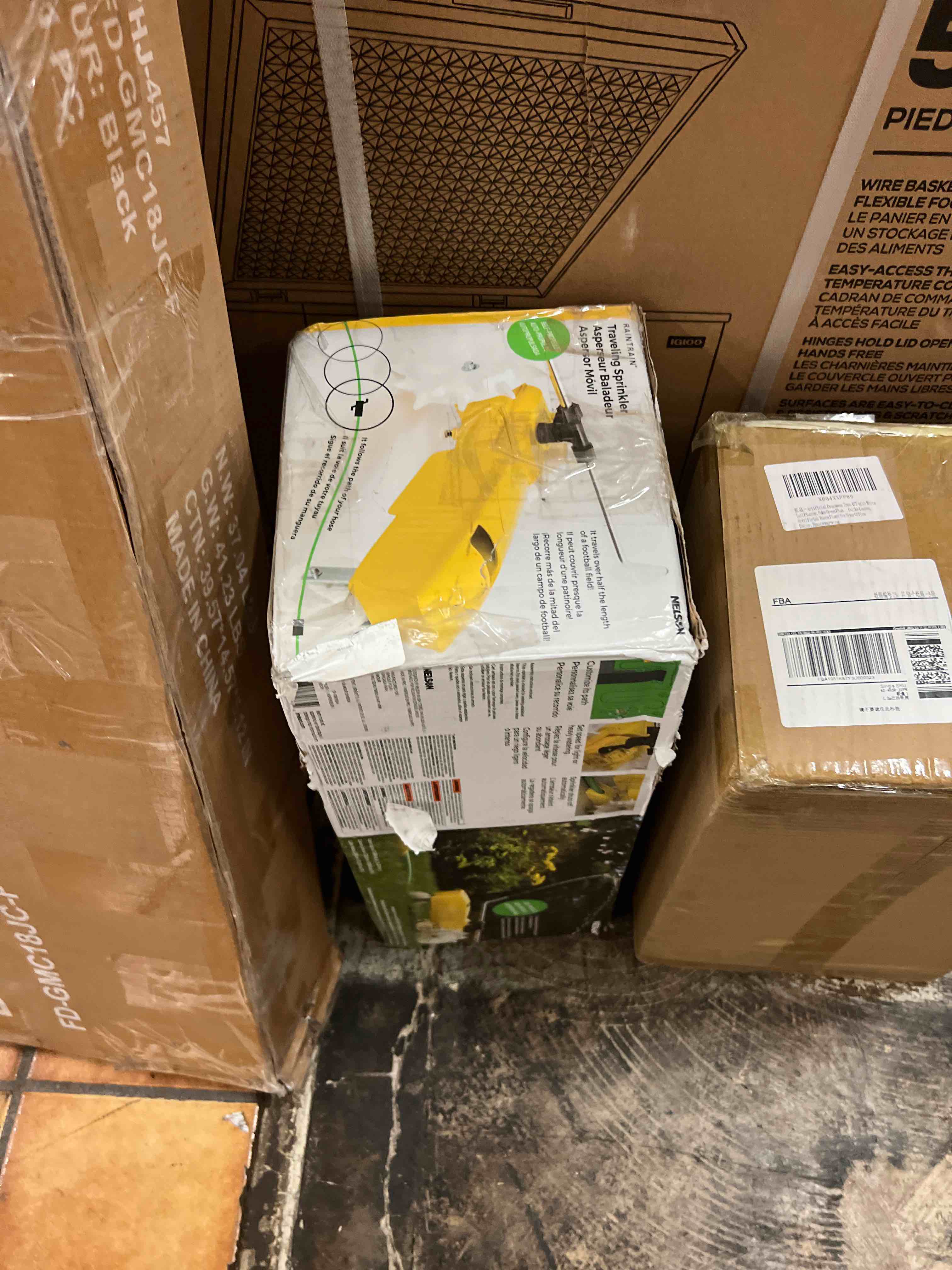 Condition photo showing New/Like New for nelson rain train 13,500 square feet cast iron outdoor lawn traveling water sprinkler for yard, and garden, with auto shut off, yellow