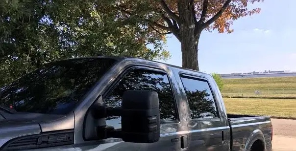 Auto Ventshade (AVS) by RealTruck 194381 In-Channel Ventvisor Side Window Deflector  4-Piece Set For 2017-2021 Ford F-250  F-350  F-450 Super Duty With Supercrew Cab   Black