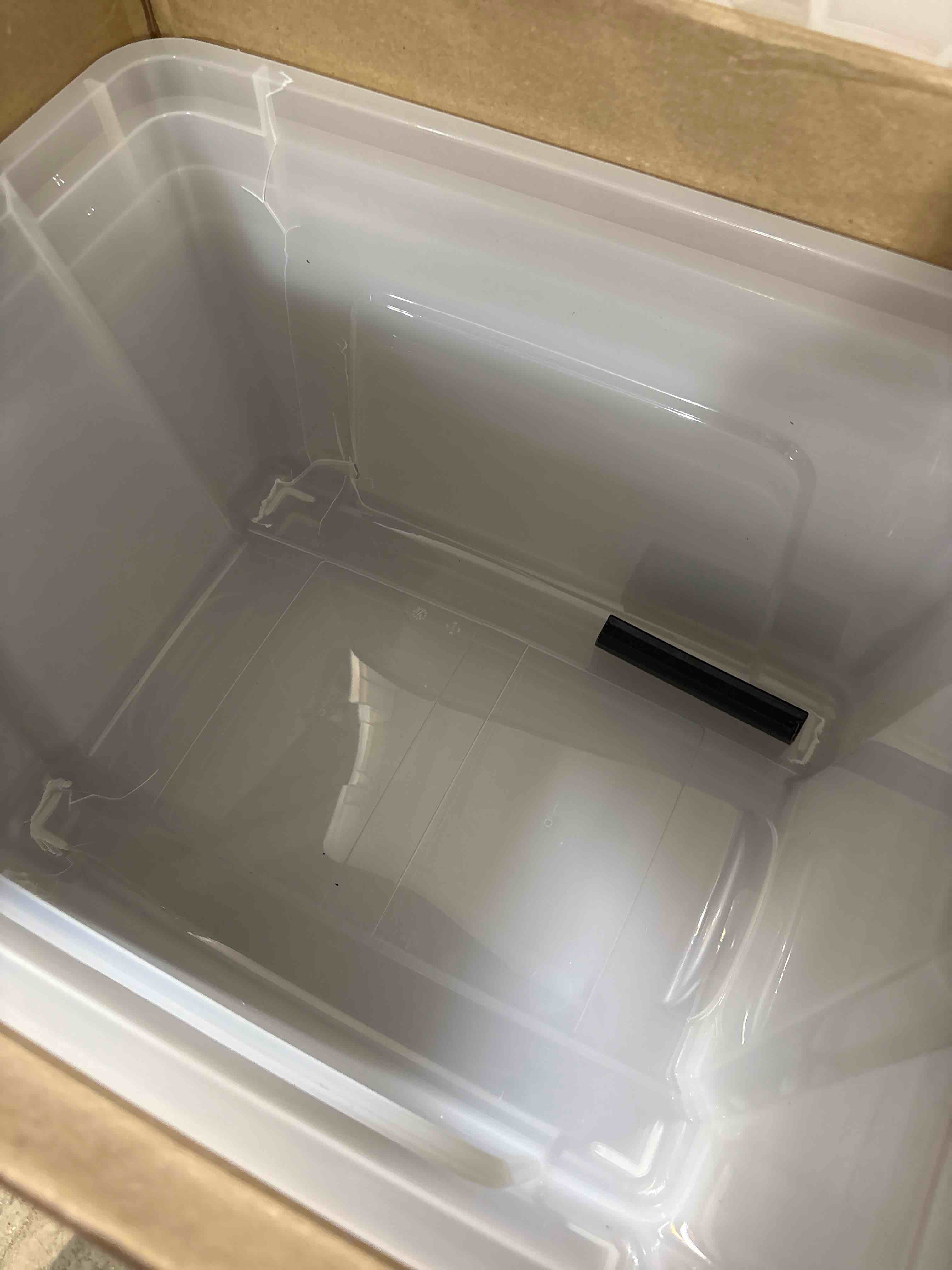 Condition photo showing Good Condition for IRIS USA 40 Qt Stackable Plastic Storage Bins with Lids, 4 Pack - BPA-Free, Made in USA - See-Through Organizing Solution, Latches, Durable Nestable Containers, Secure Pull Handle - Clear Clear 40 Qt 4 Pack, 1 is cracked, 3 are good*