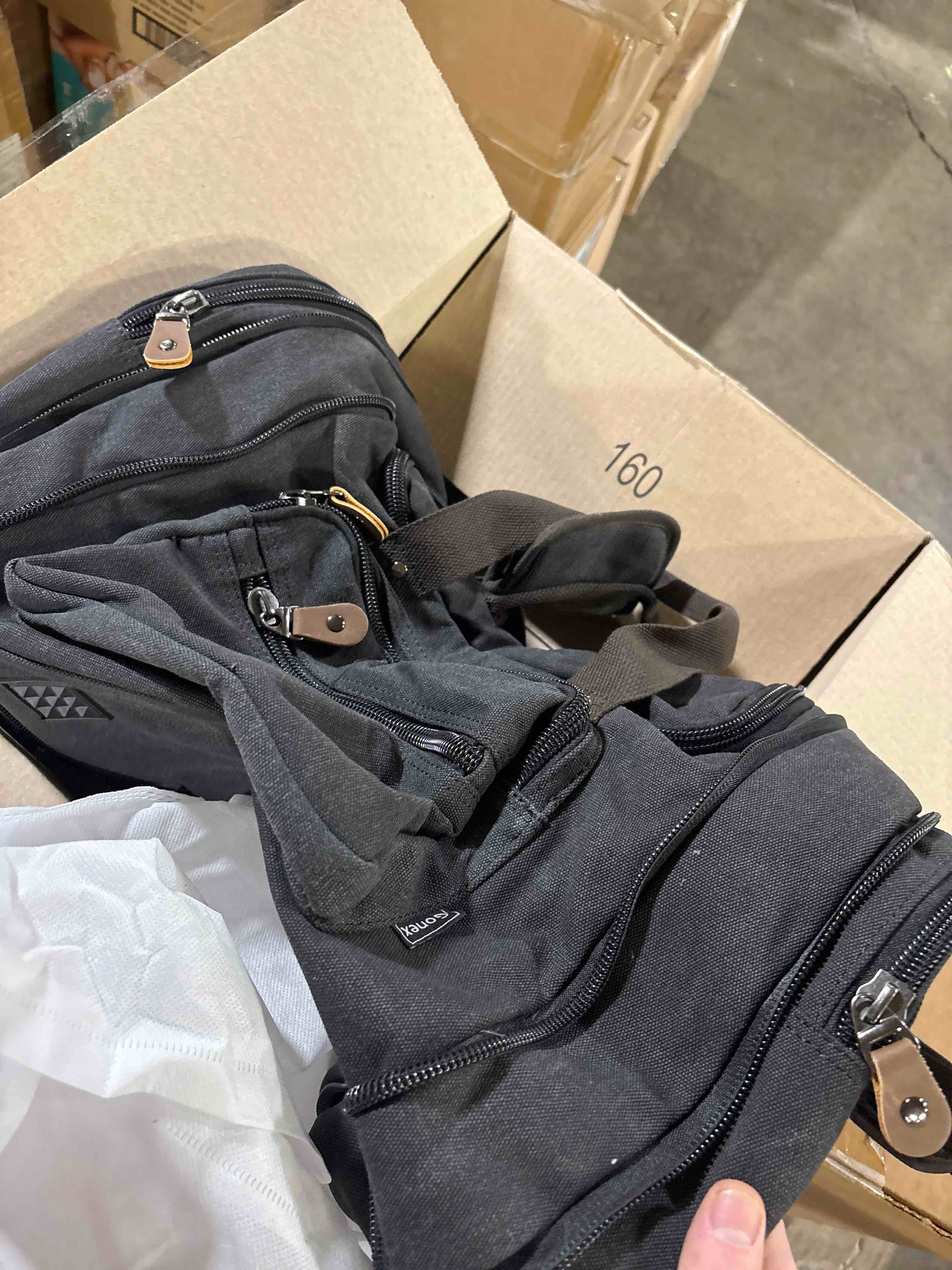 Condition photo showing New/Like New for Gonex Canvas Duffle Bag for Travel 50L Expandable Duffel Weekend Overnight Bag men (Dark Gray)