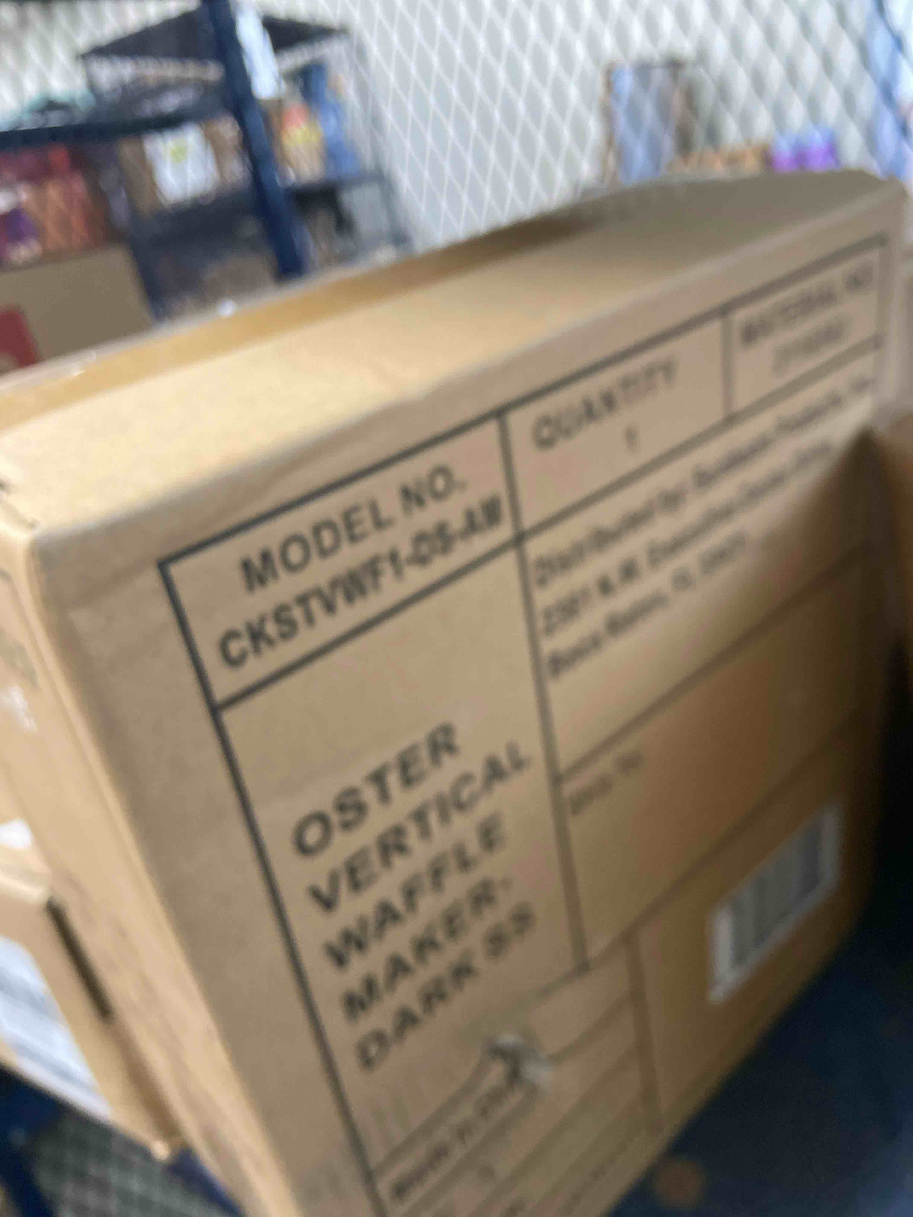 Condition photo showing New/Like New for oster vertical waffle maker