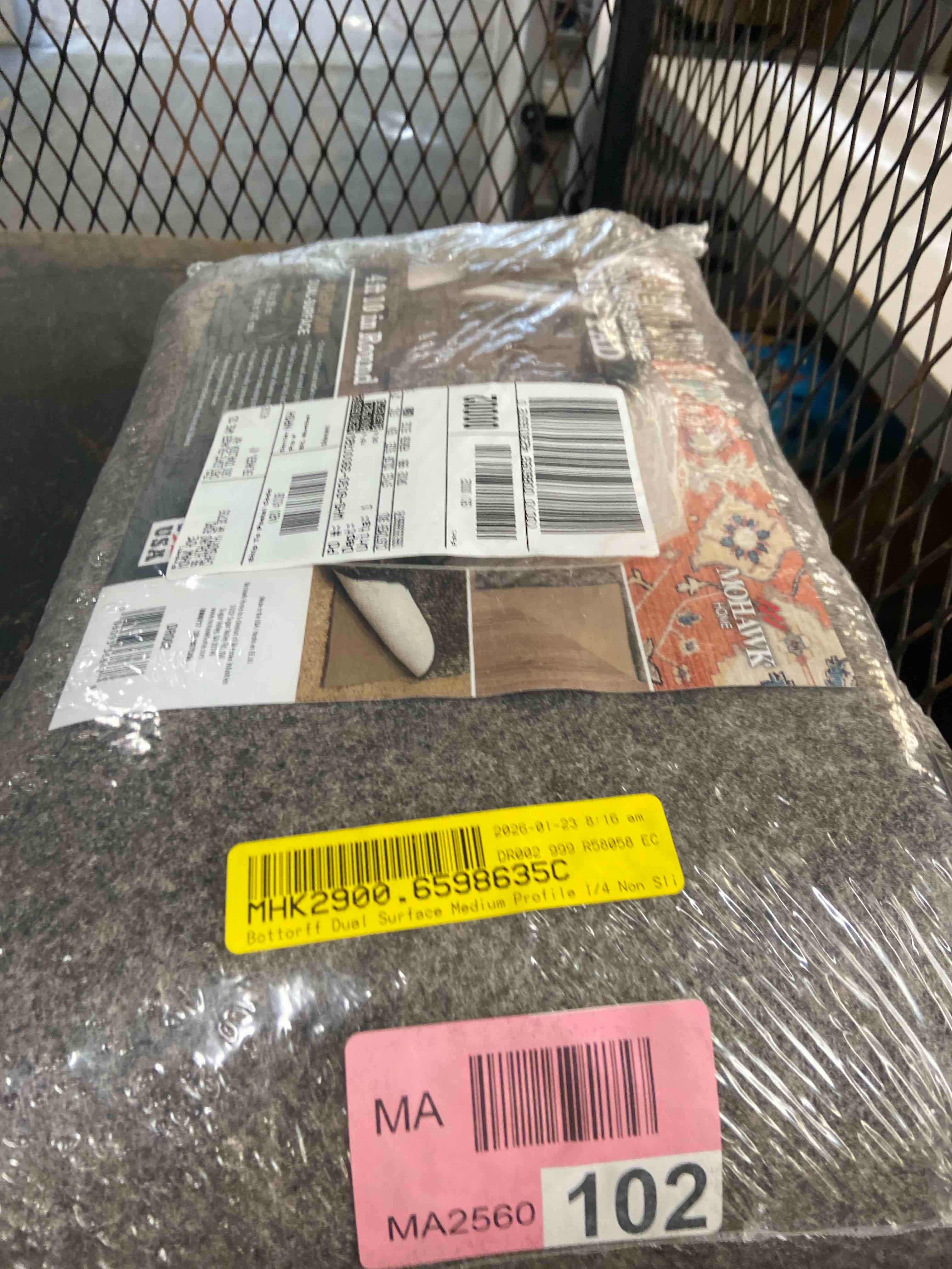 Condition photo showing New/Like New for mohawk 4'10" round premium dual surface rug pad brown: skid-resistant, polyester, latex backing, gray