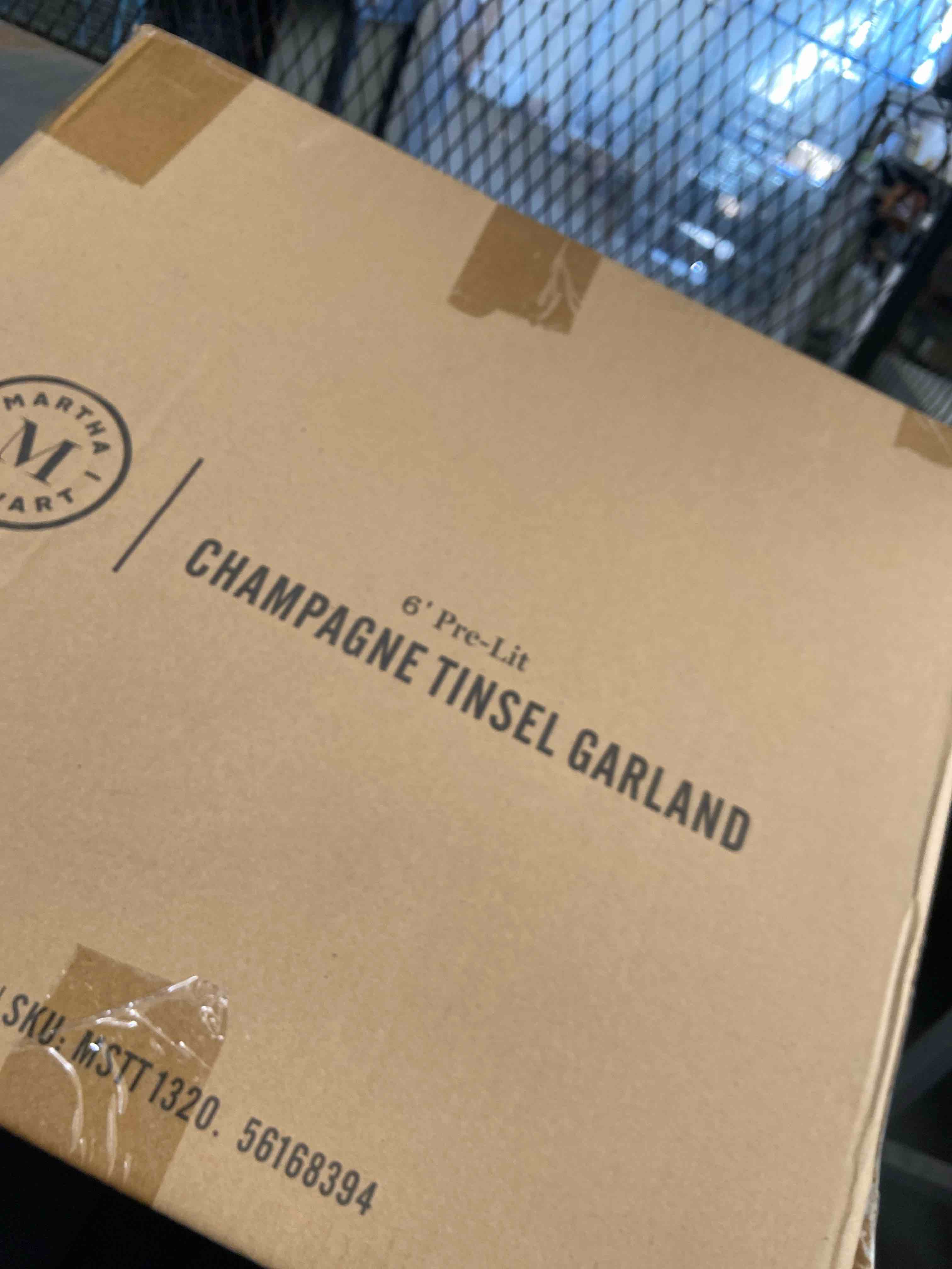 Condition photo showing New/Like New for 6” pre lit champagne tinsel garland 