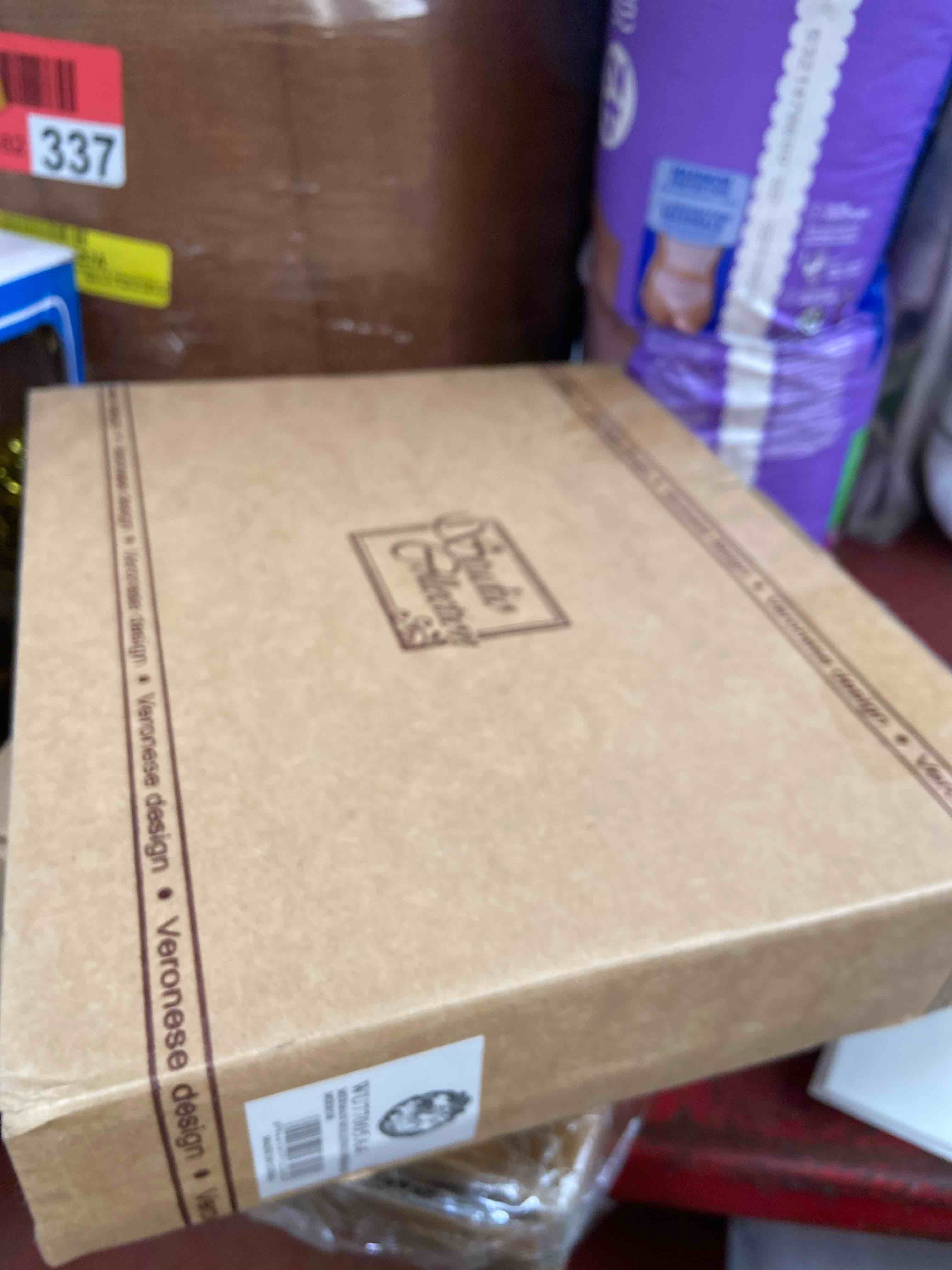 Condition photo showing New/Like New for holding on merman & mermaid in a fluid embrace bronze & gold finish wall mirror