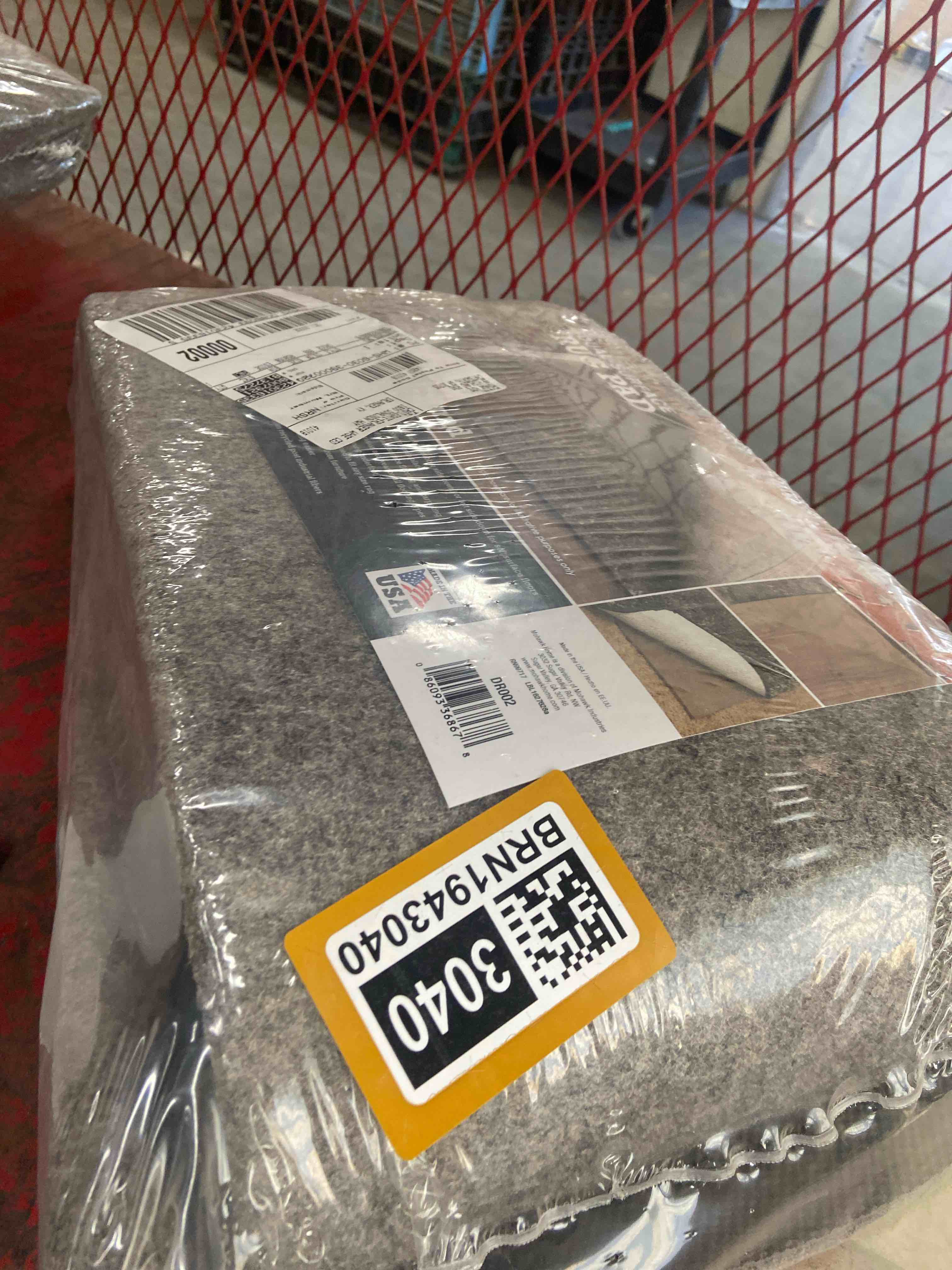 Condition photo showing New/Like New for mohawk 4'10" round premium dual surface rug pad brown: skid-resistant, polyester, latex backing, gray