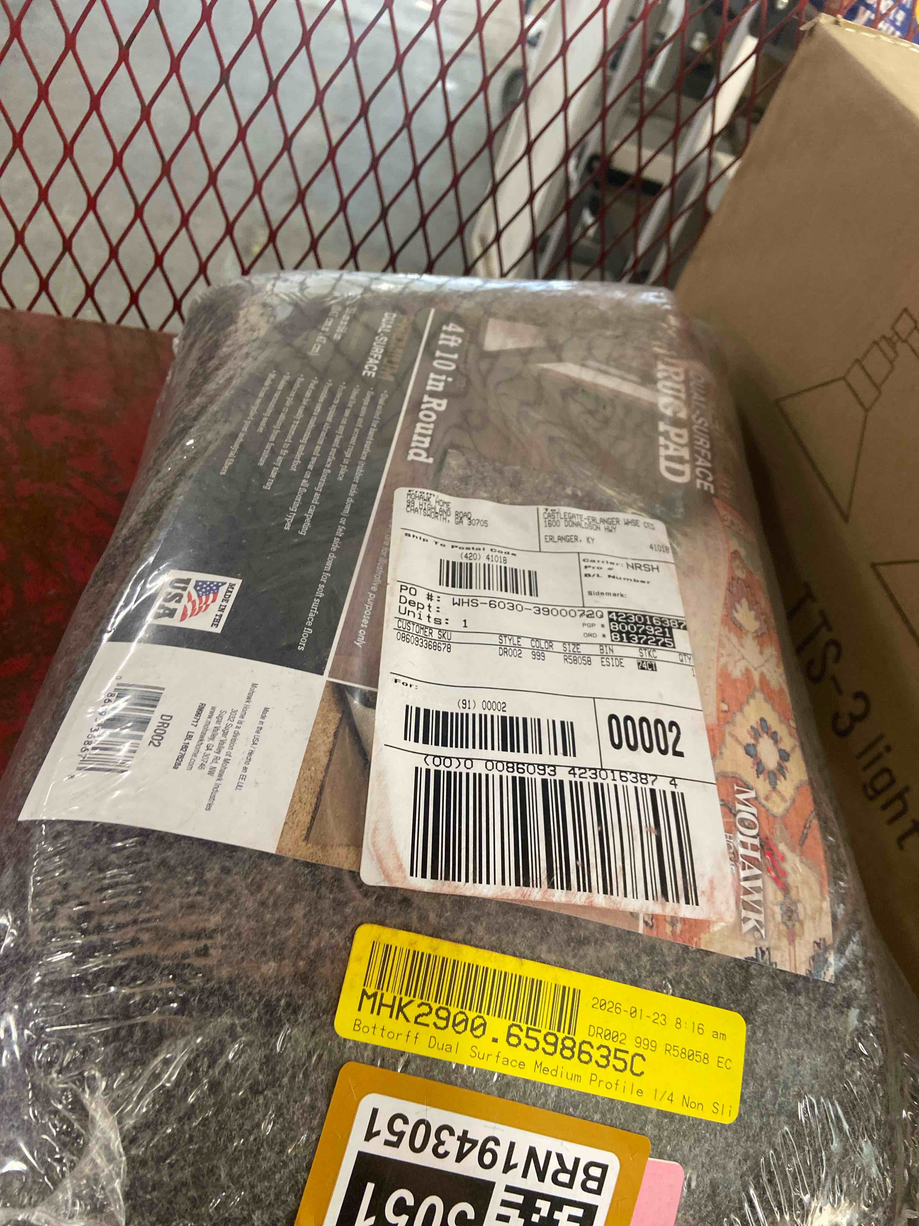 Condition photo showing New/Like New for mohawk 4'10" round premium dual surface rug pad brown: skid-resistant, polyester, latex backing, gray