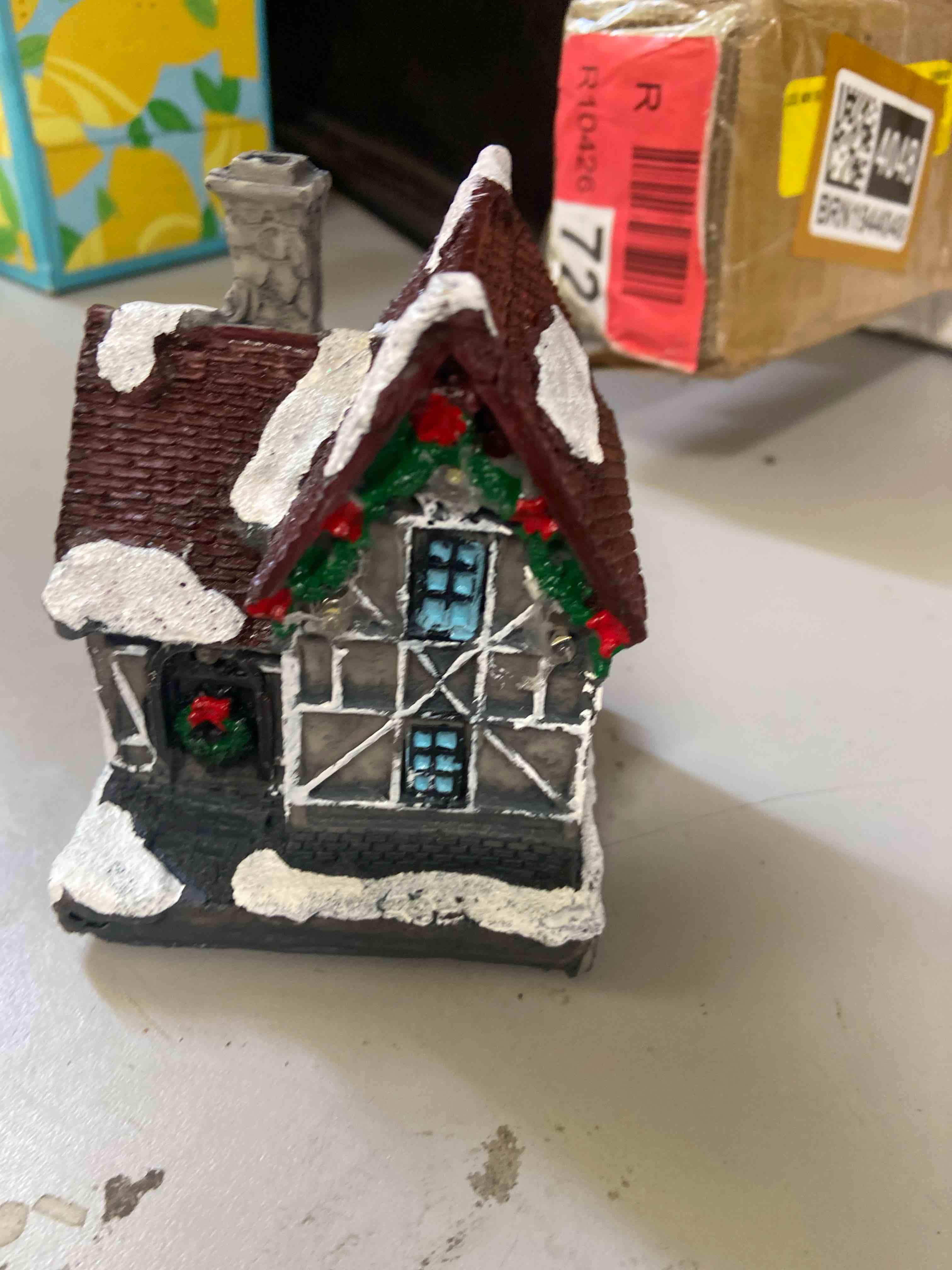 Condition photo showing New/Like New for mini 4.72inch christmas village house with lights 