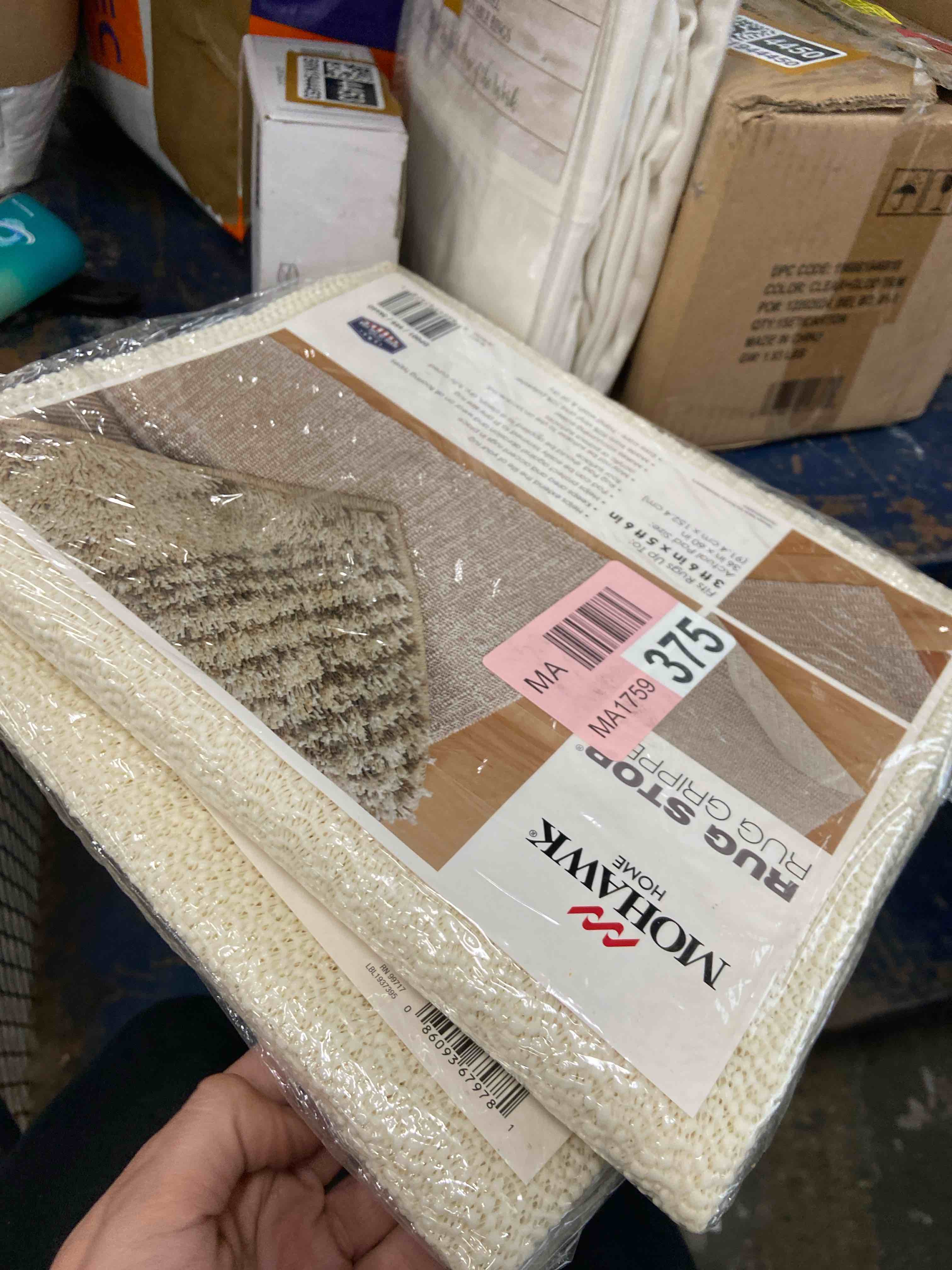 Condition photo showing New/Like New for mohawk home 3' x 5' non slip rug pad gripper, made in usa, grips keeps area rugs in place – safe for all floors