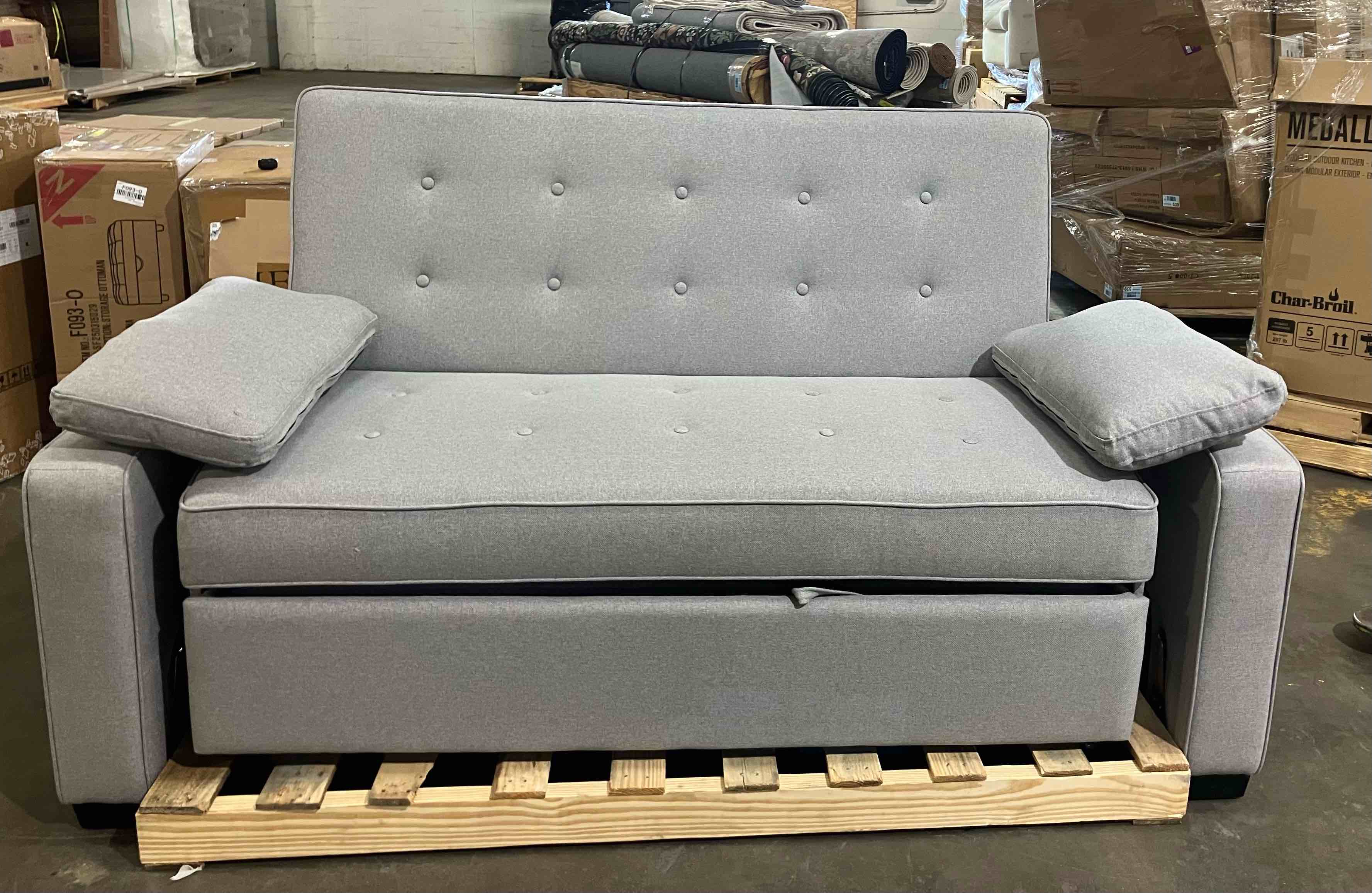 Condition photo showing Good Condition for serta tina 73 in. light gray polyester queen size 2-seat sofa bed (arms are not attached yet) - (good condition because of damage to one of the wheels to the pullout section)