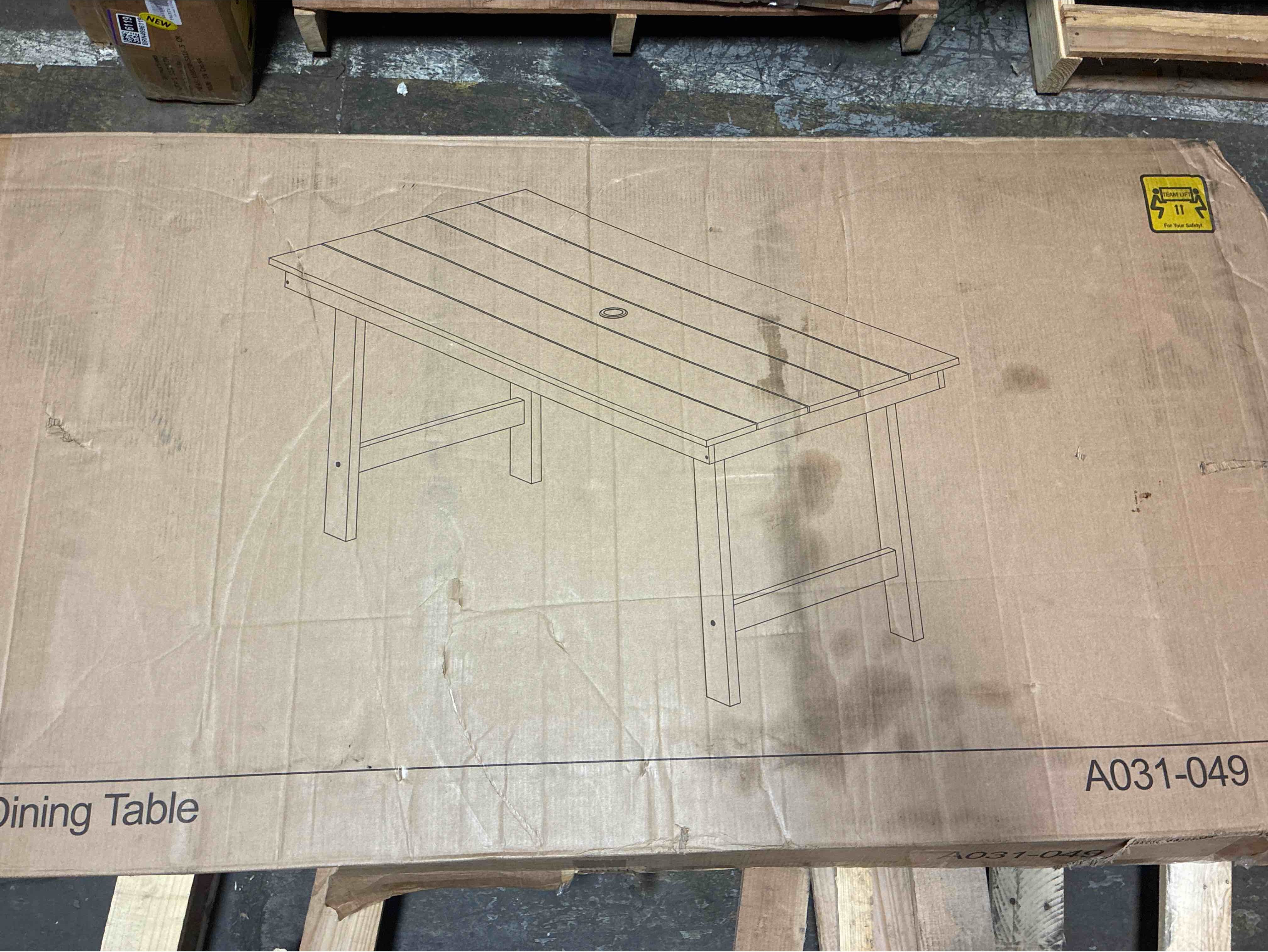 Condition photo showing New/Like New for lark manor kahn reata brown outdoor dining table. 66.93 h x 32.28 d x 29.13 w