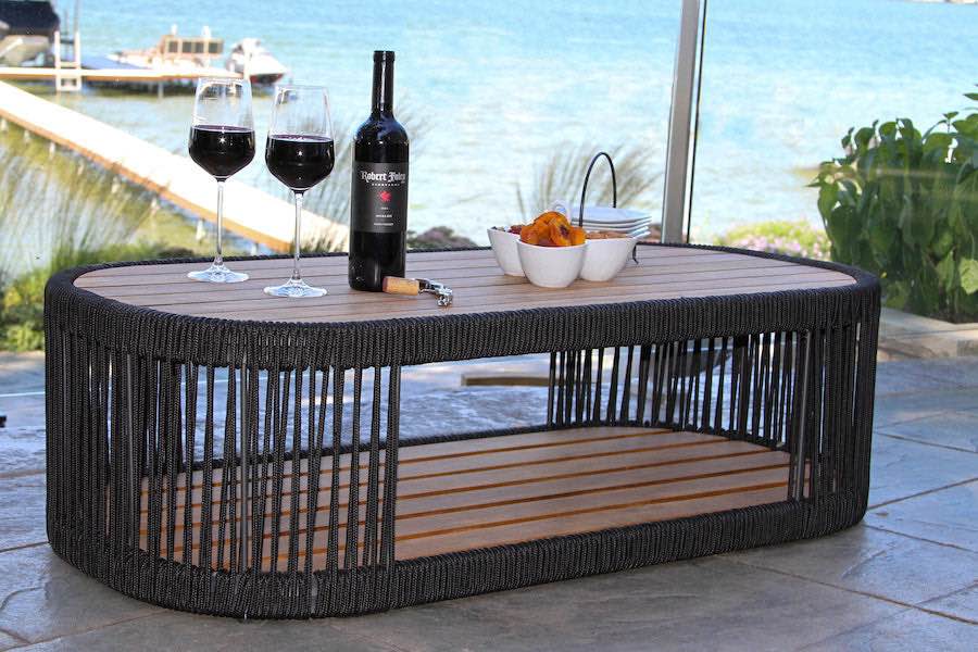 Condition photo showing New/Like New for outdoor interiors tna8785 black rope and teak coffee table. 30.5 w x 31 d x 25 h