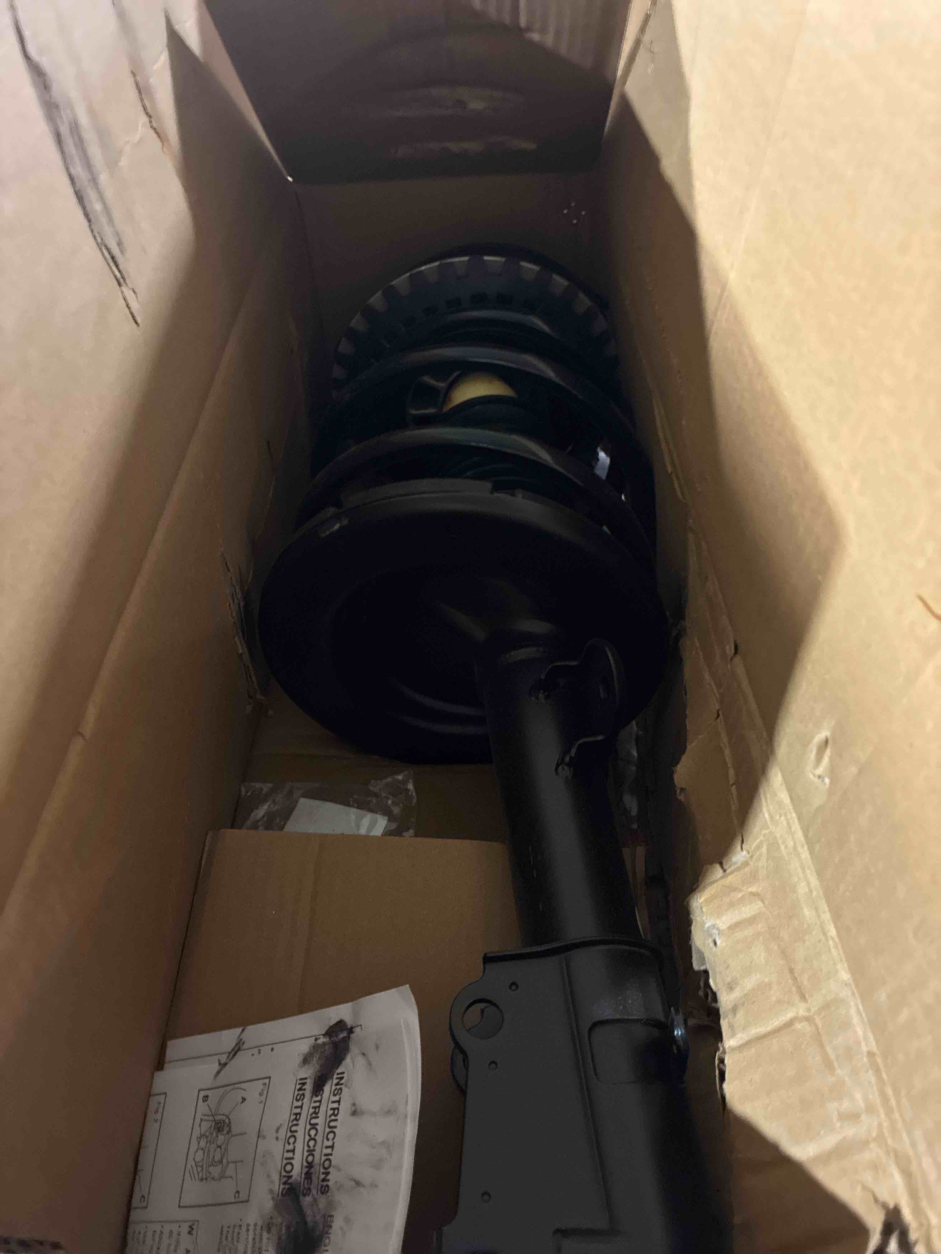 Condition photo showing New/Like New for trq front strut and spring assembly set 2 piece compatible with 2001-2007 chrysler town & country 01-03 voyager 01-07 dodge caravan 01-07 grand caravan