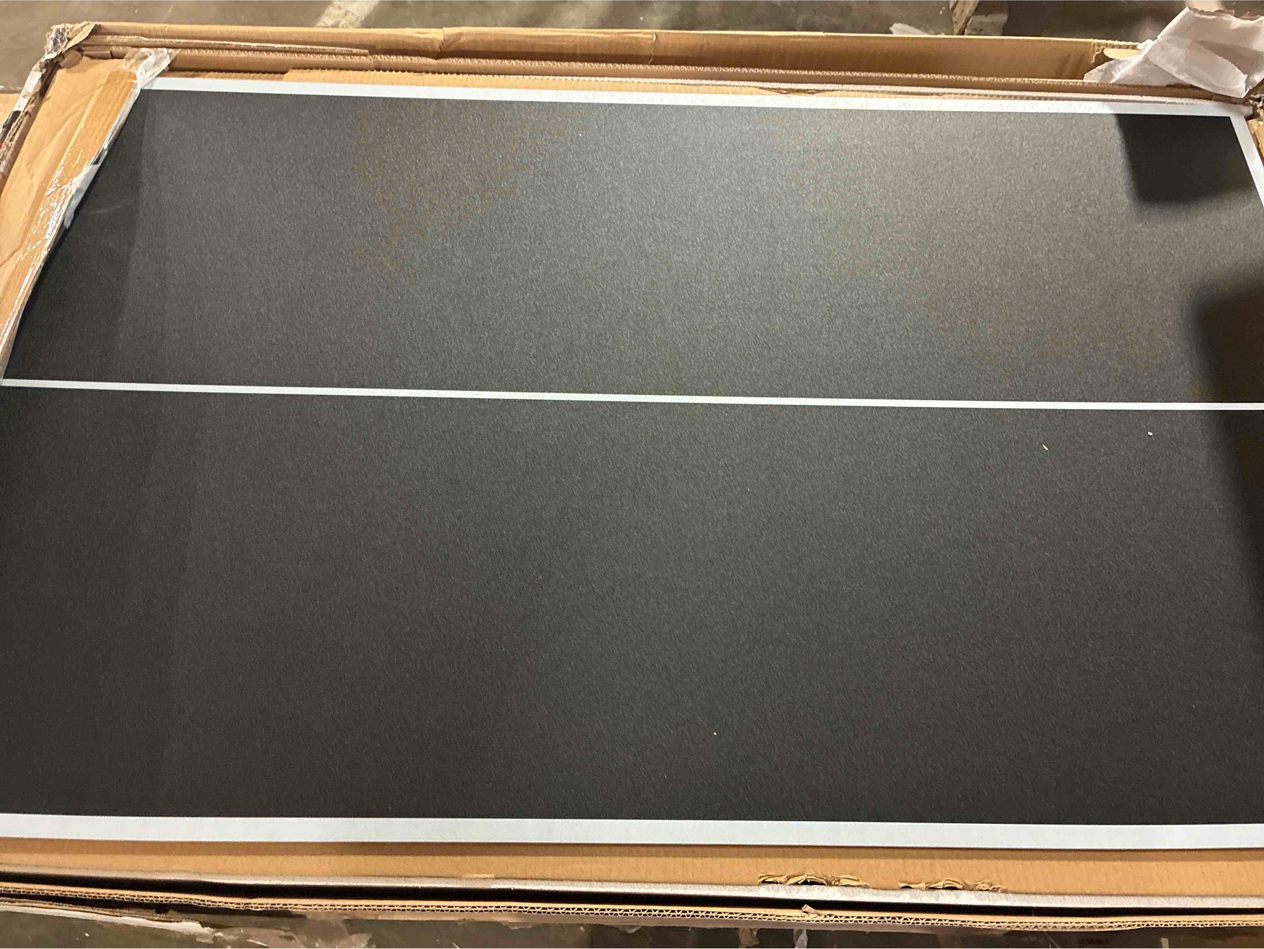 Condition photo showing Good Condition for Atomic 56" 4-in-1 Game Table with Accessories - (Good condition because Inner left corner has some damage, with some adhesive will not effect functioning. All Accessories included & are Brand new)  55.91" L x 28.35" W x 34.25" H