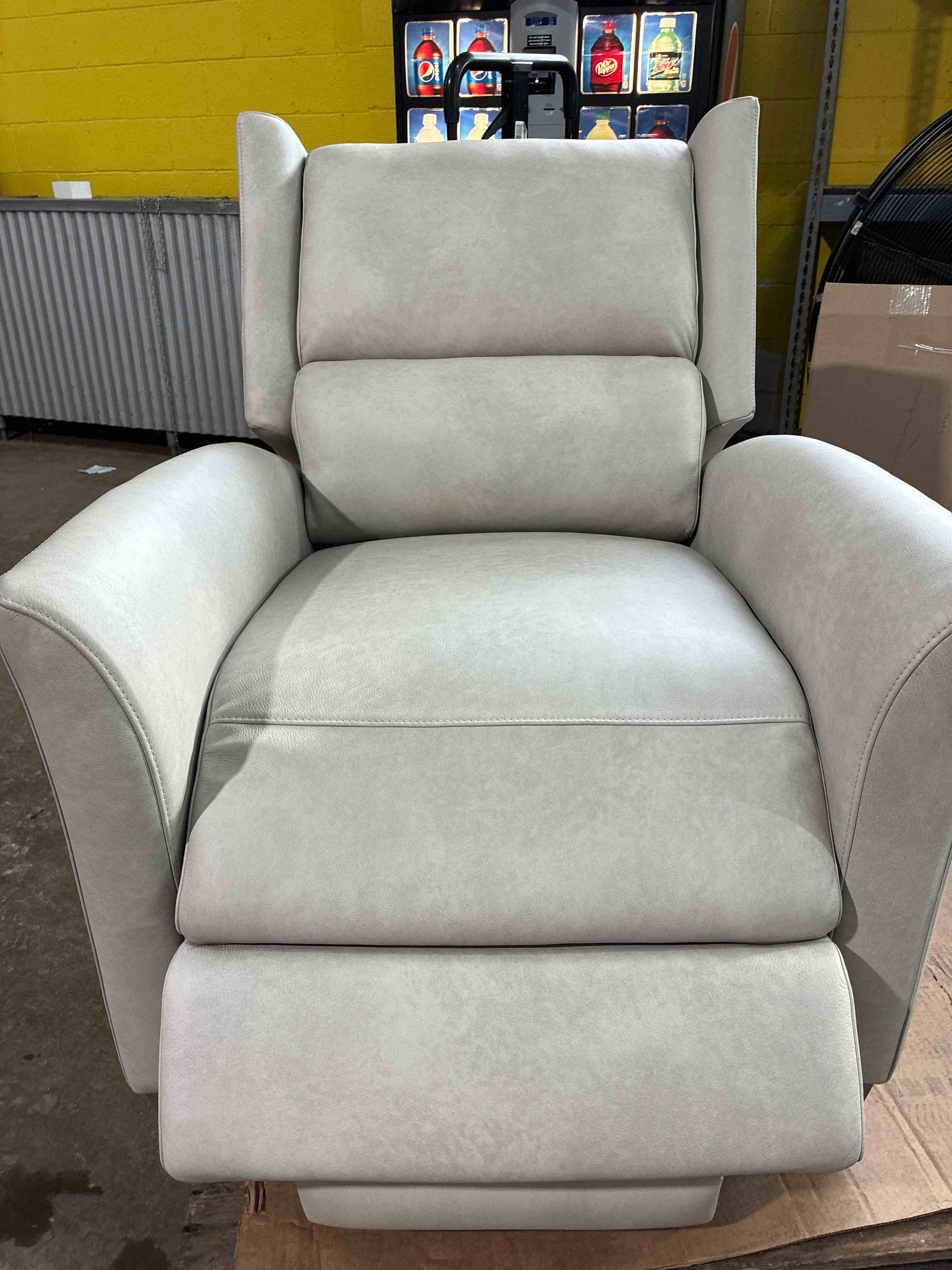 Condition photo showing New/Like New for Weller 32.3" Wide Smokey Grey Genuine Leather Power Wing Back Full Body Recliner Chair with USB port and Distressed Grey Washed Wooden Feet. Minor scratches on legs, small mark on back left corner of chair, functions perfectly and has a beautiful front. 45.6'' H X 32.3'' W X 40'' D