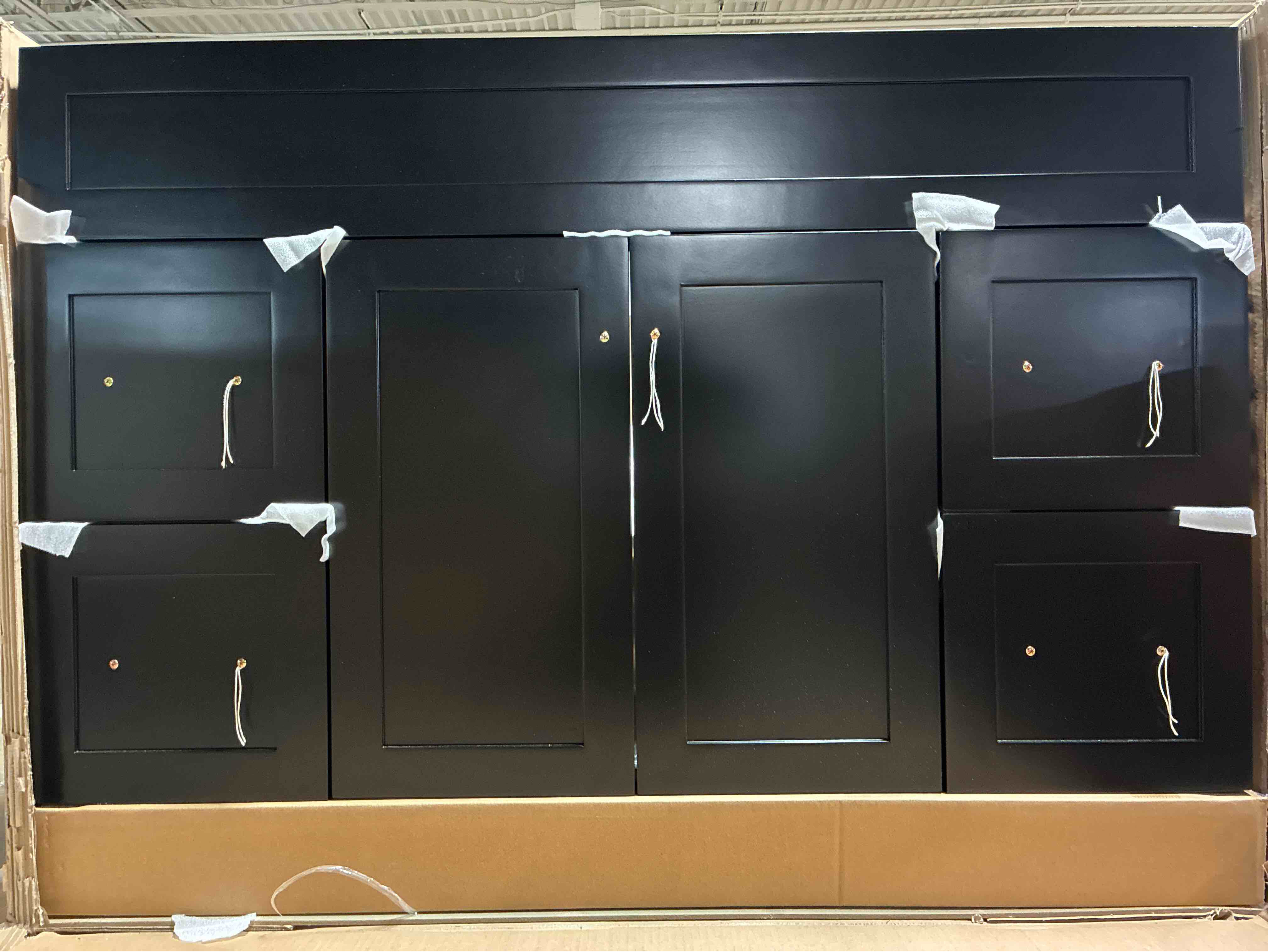 Condition photo showing New/Like New for Ariel Hamlet 49 In. Black Aspen Wood Rectangle Single Sink Vanity with 1 Cabinet, 4 Drawers, Silver Handles. Sink bowl is included and in brand new condition, sink top can be purchased through Ariel in the Hamlet collection. 49"W x 22"D x 36"H