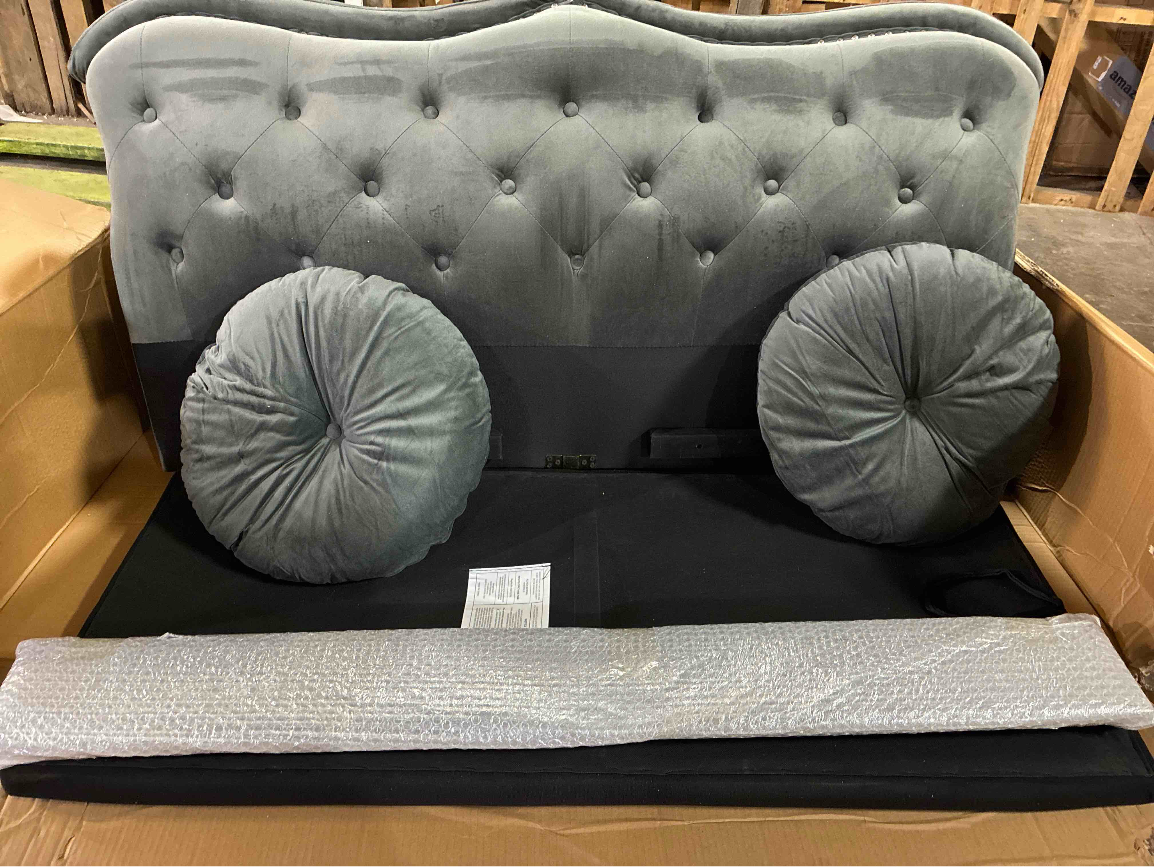 Condition photo showing Good Condition for Glory Furniture Hollywood Tufted Silver Button Upholstered Grey Velvet Rolled Arm Loveseat, Pillows included. Very small .03” tear in top back of sofa, otherwise perfect condition. 