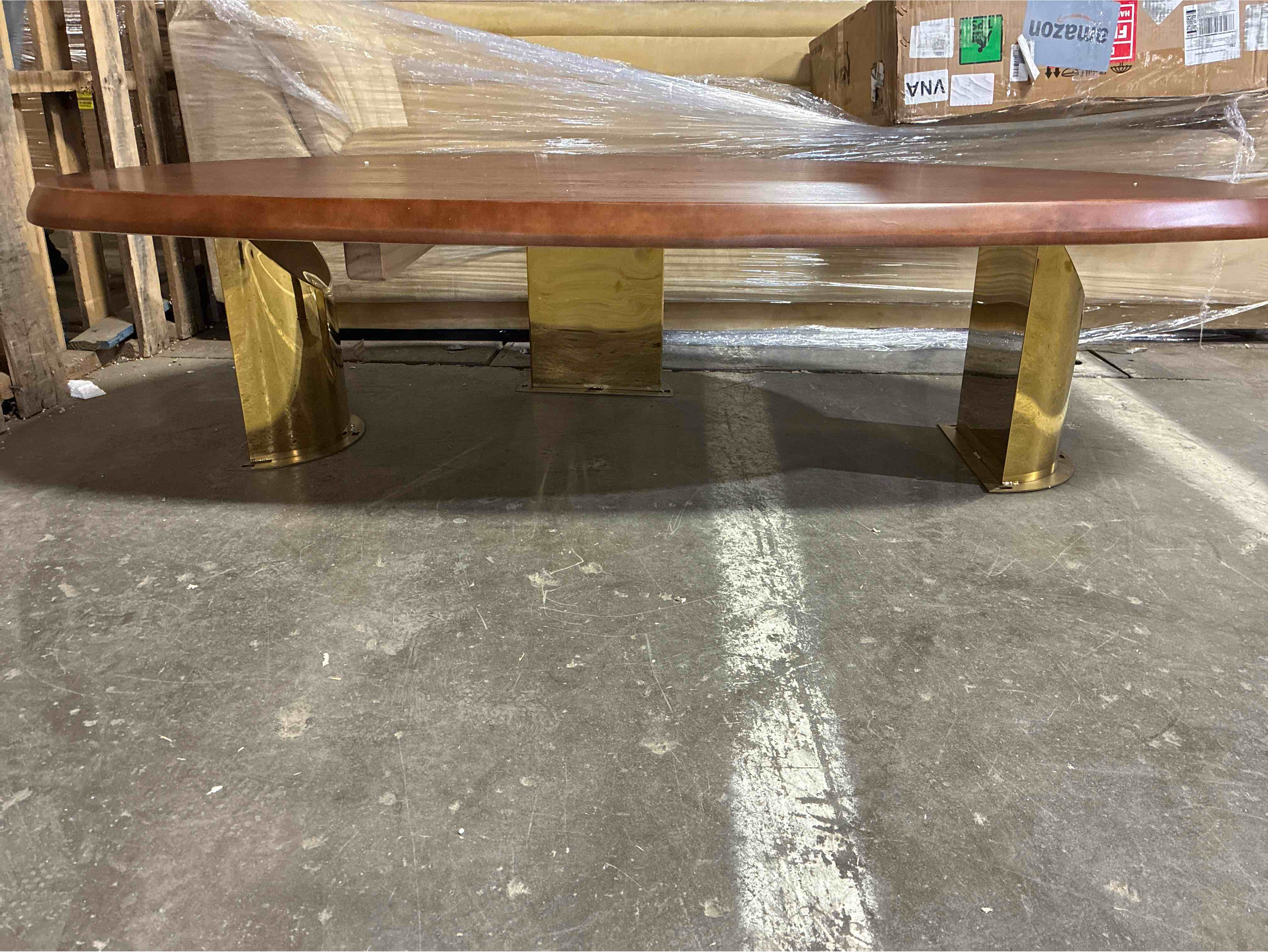 Condition photo showing As Is for Refurbished Modern Walnut Wood Low Standing Coffee Table with Gold Metal Legs, Legs are not attached only for show, will need drilled in. Small chip on left side of table top otherwise beautiful condition, hardware is included. 61.5” L x 30” W x 14” H