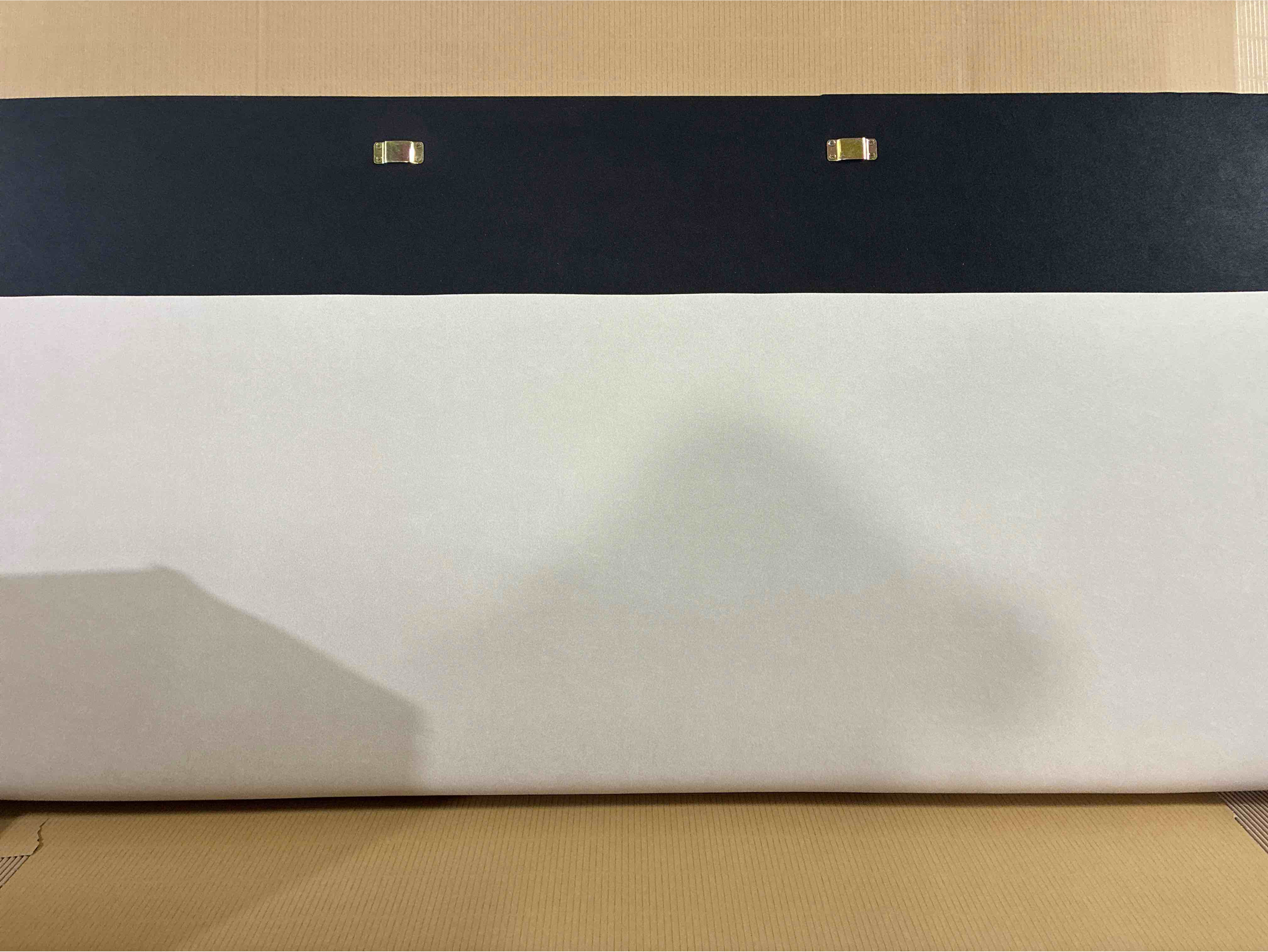 Condition photo showing As Is for Cameron King Size Soft Velvet Grey Low Profile DG Casa Headboard, Headboard only, small tear in felt base otherwise in brand new condition.