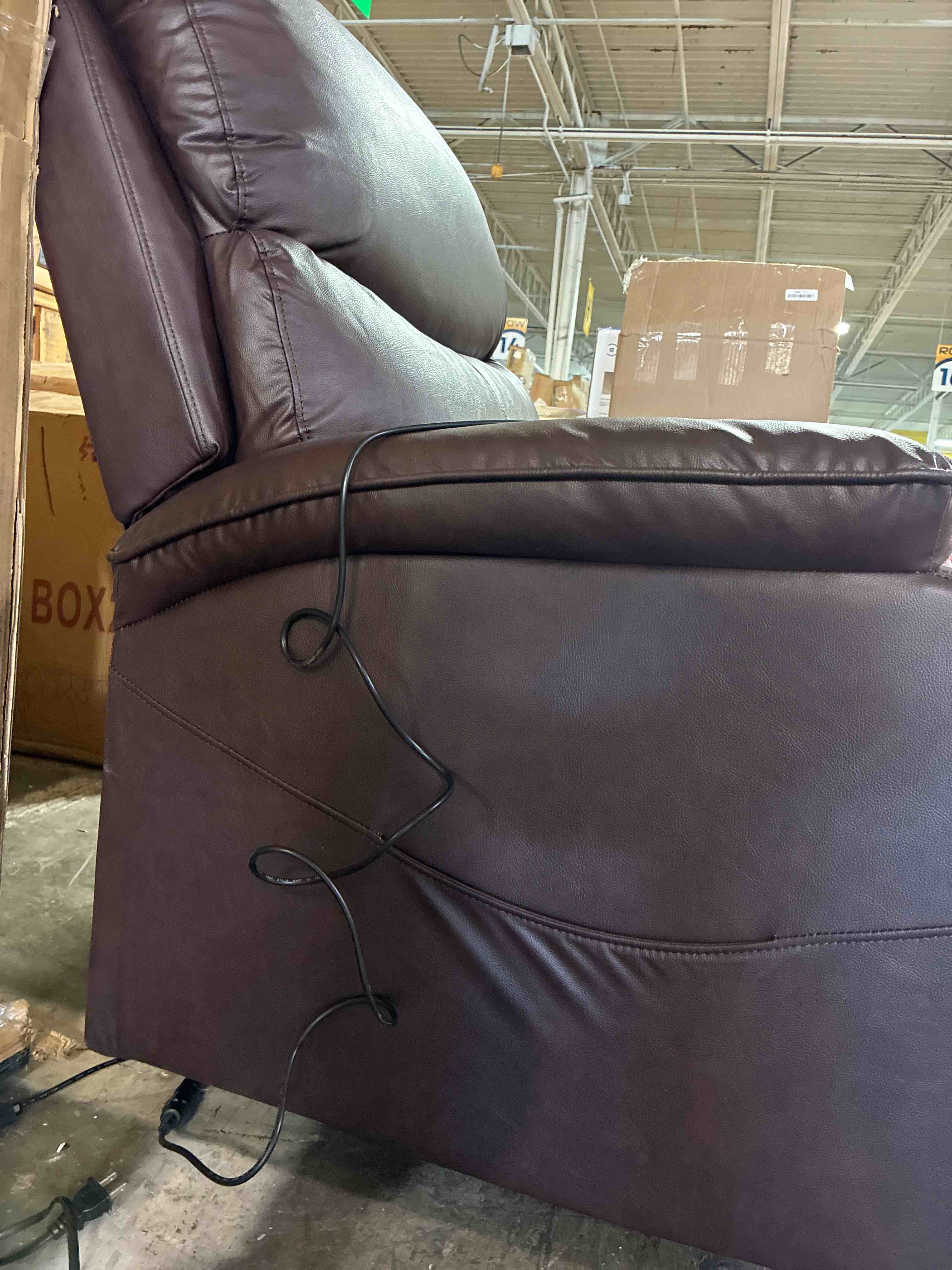 Condition photo showing Good Condition for Brown Vegan Leather Power Lift Recliner With Massage Remote. Has Side Pocket and USB Port, gently used. All functions work perfectly. 